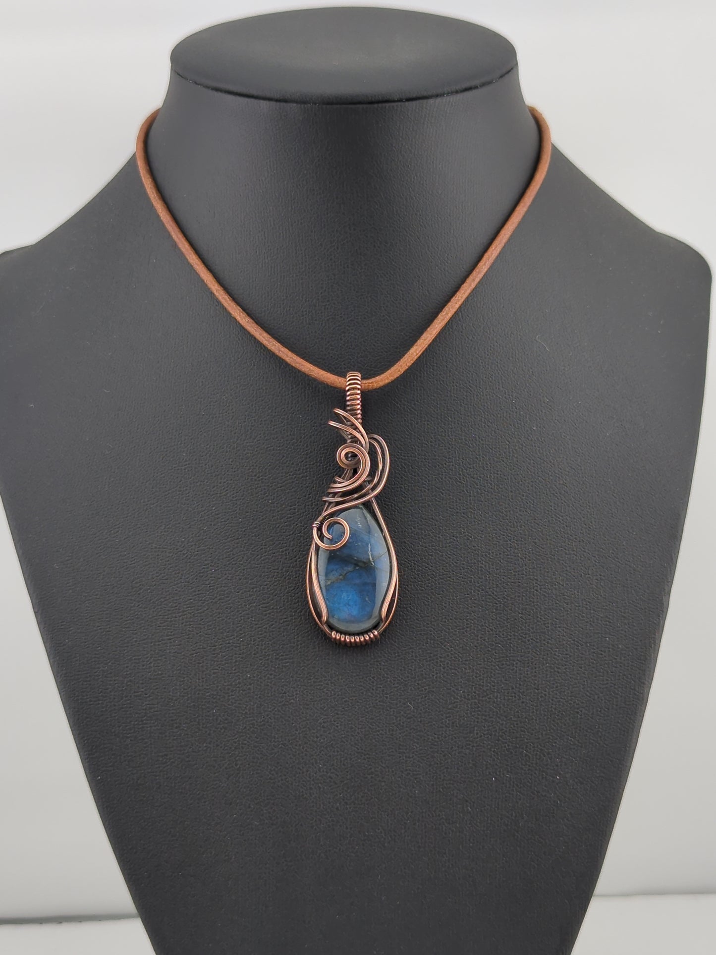 Labradorite gemstone pendant, with blue flash, set in antiqued copper.