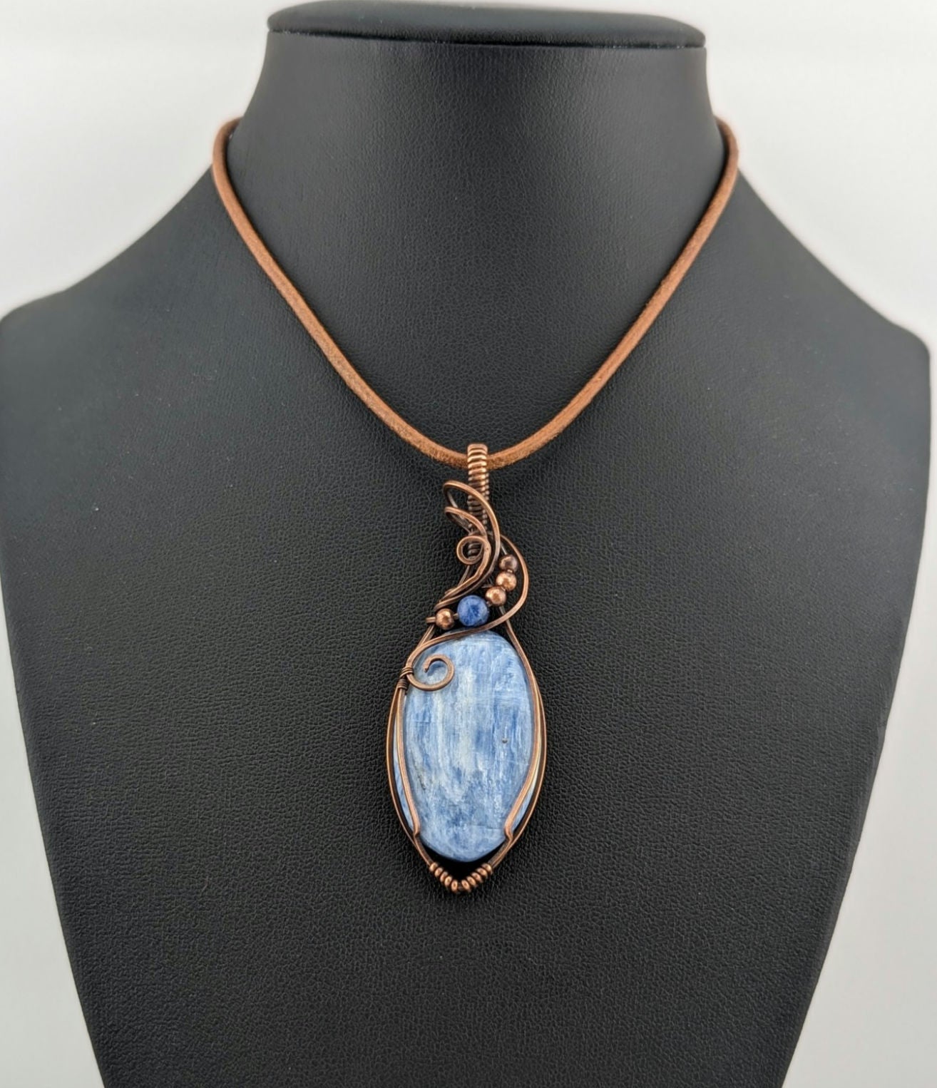 Kyanite, set in antiqued copper, accented with Sodalite