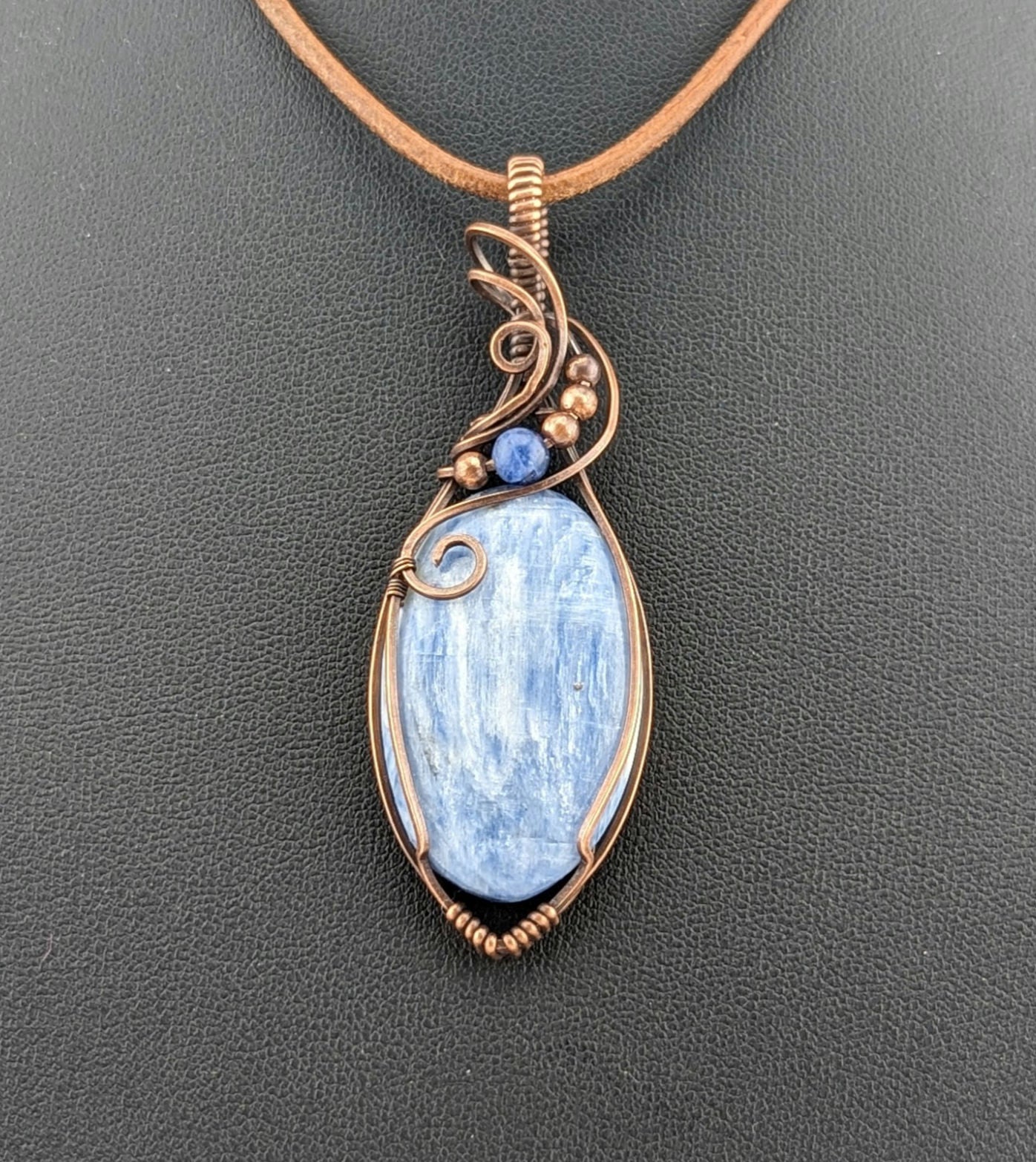 Kyanite, set in antiqued copper, accented with Sodalite