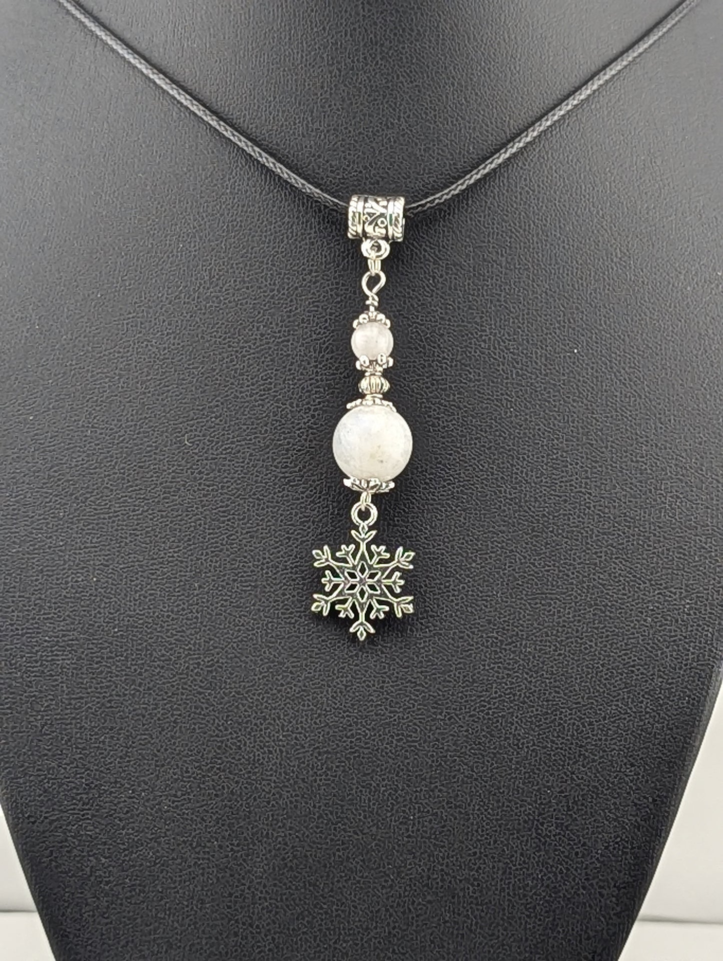 Moonstone pendant with a Snowflake charm in antiqued Silver finish