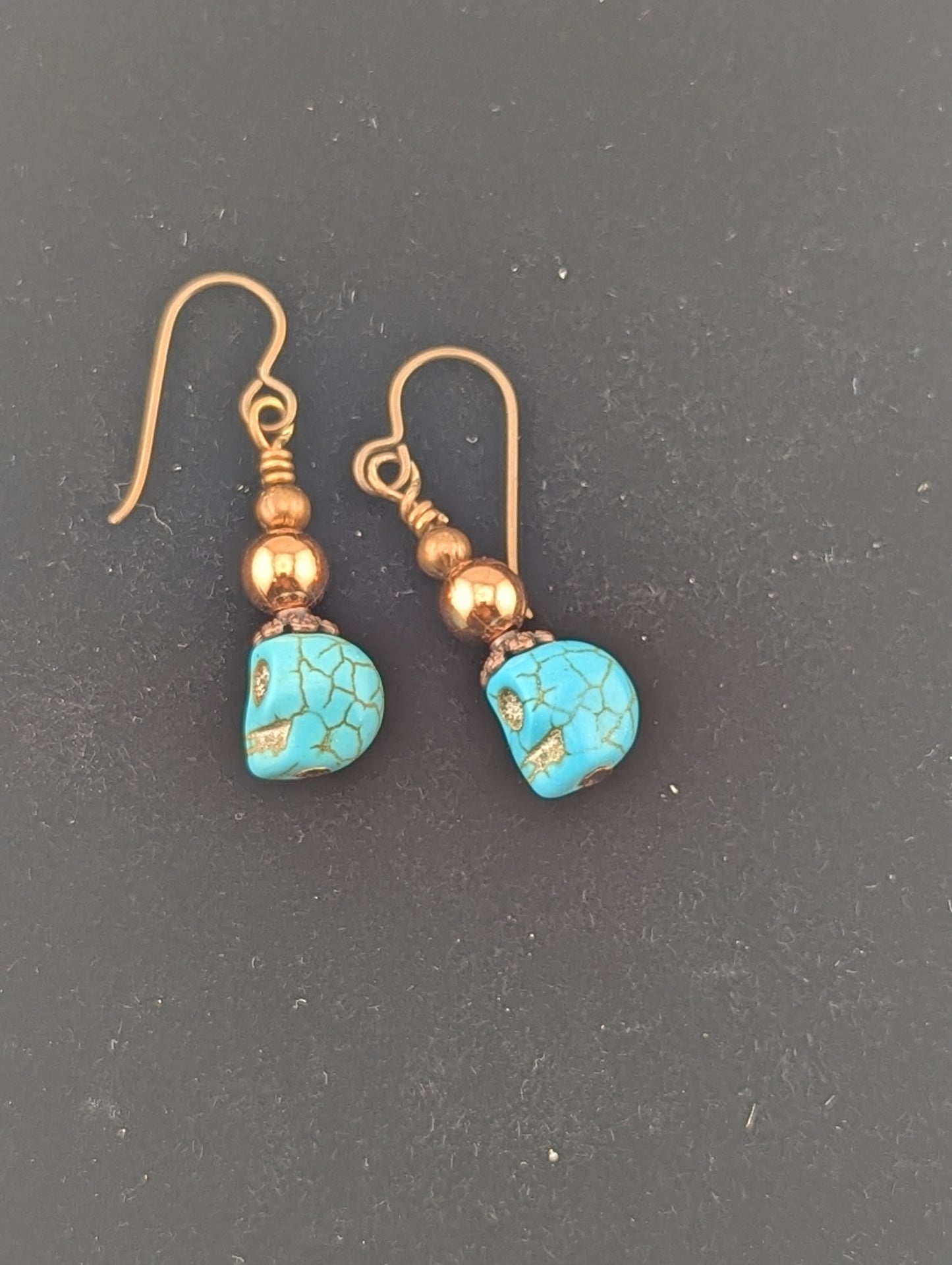 Skull earrings in antiqued Copper finish