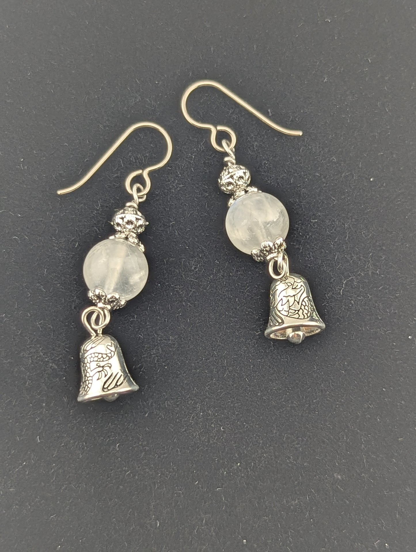 Moonstone earrings with a Bell charm in antiqued Silver finish