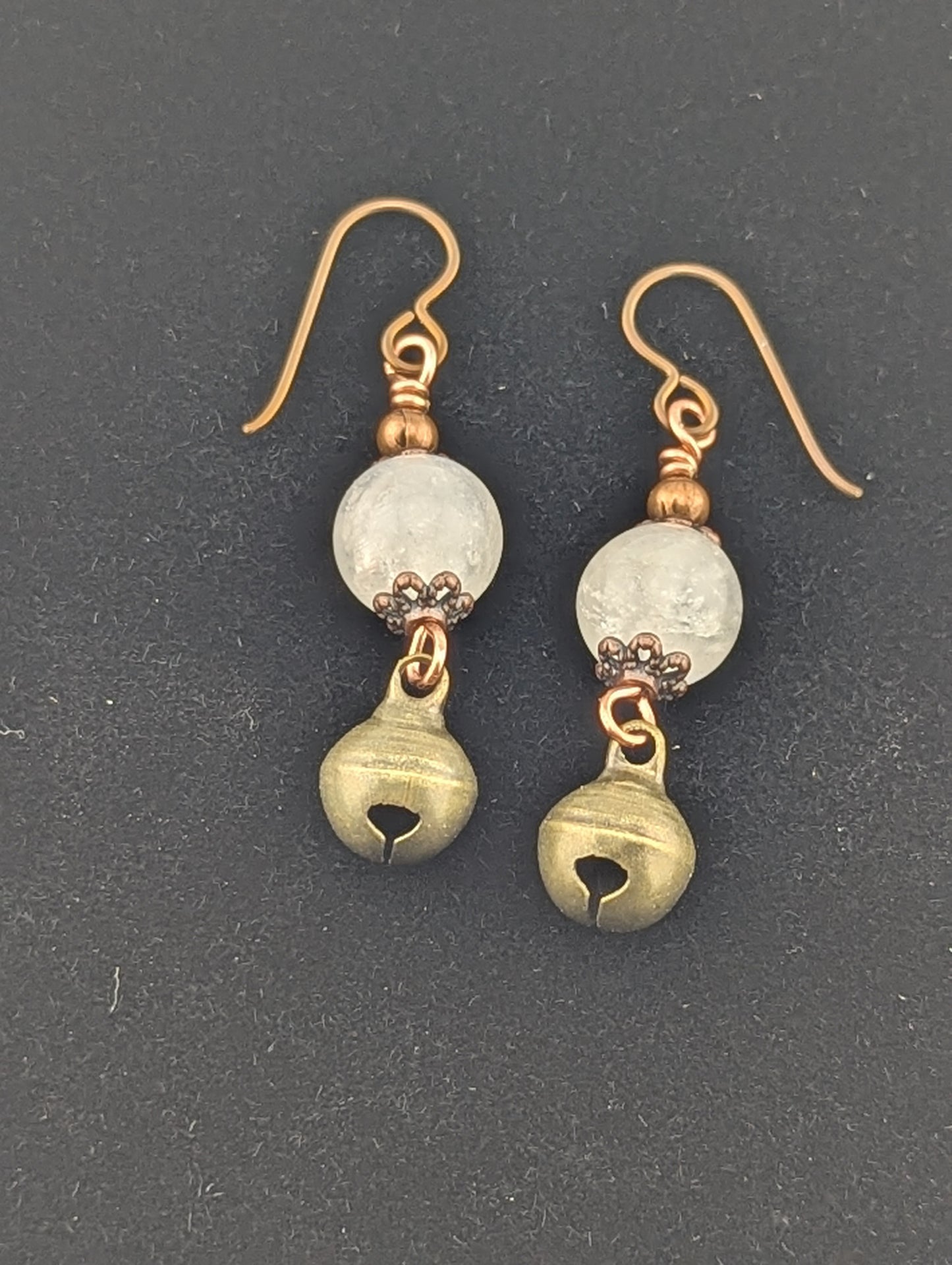 Moonstone pendant with a Jingle bell charm in antiqued Copper finish