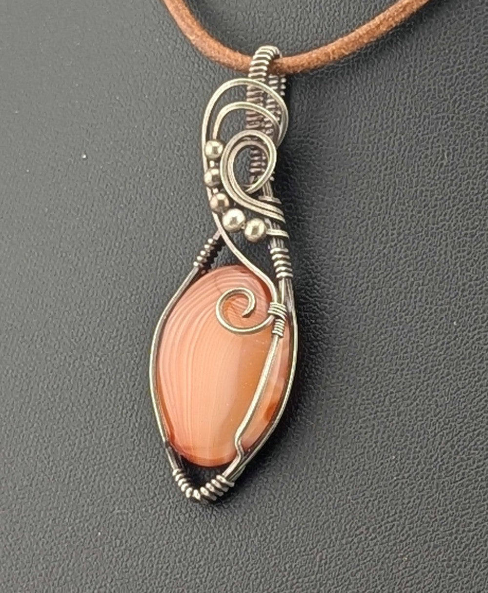 Carnelian gemstone Pendant, set in antiqued Silver.