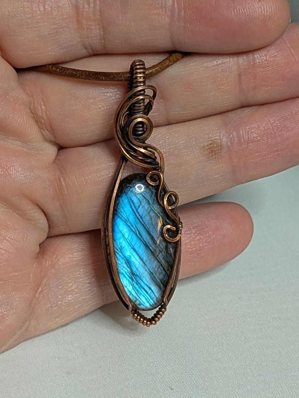Labradorite gemstone pendant, with Blue flash, set in antiqued copper