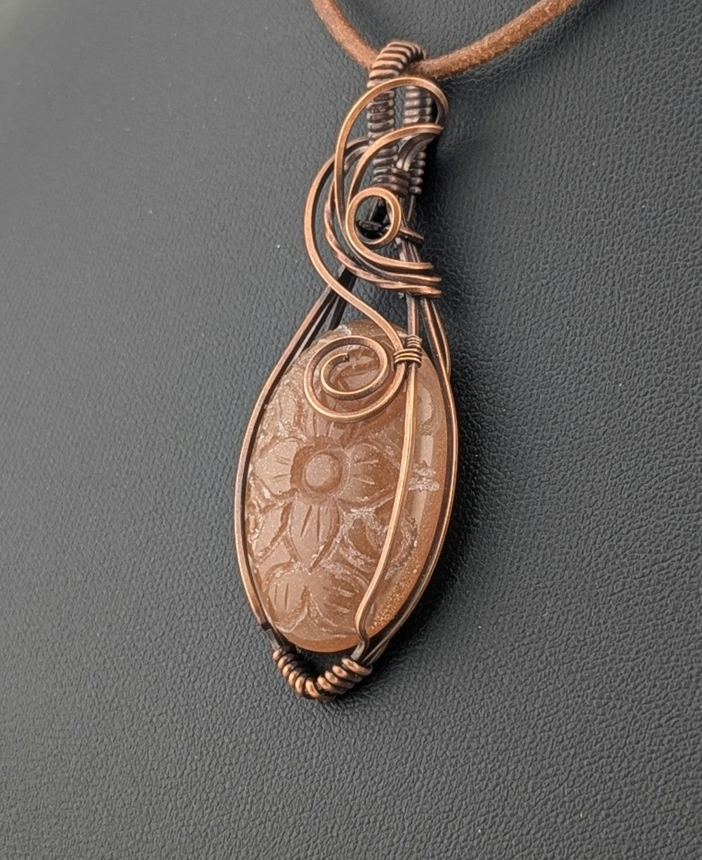 Peach Moonstone pendant, set in antiqued copper.
