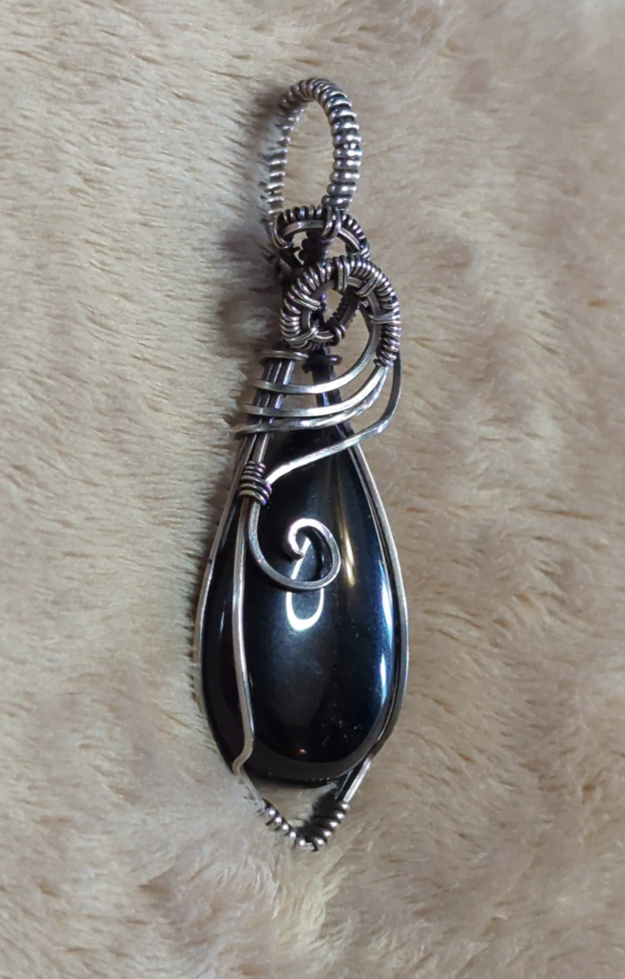 Obsidian Pendant, set in Sterling Silver.