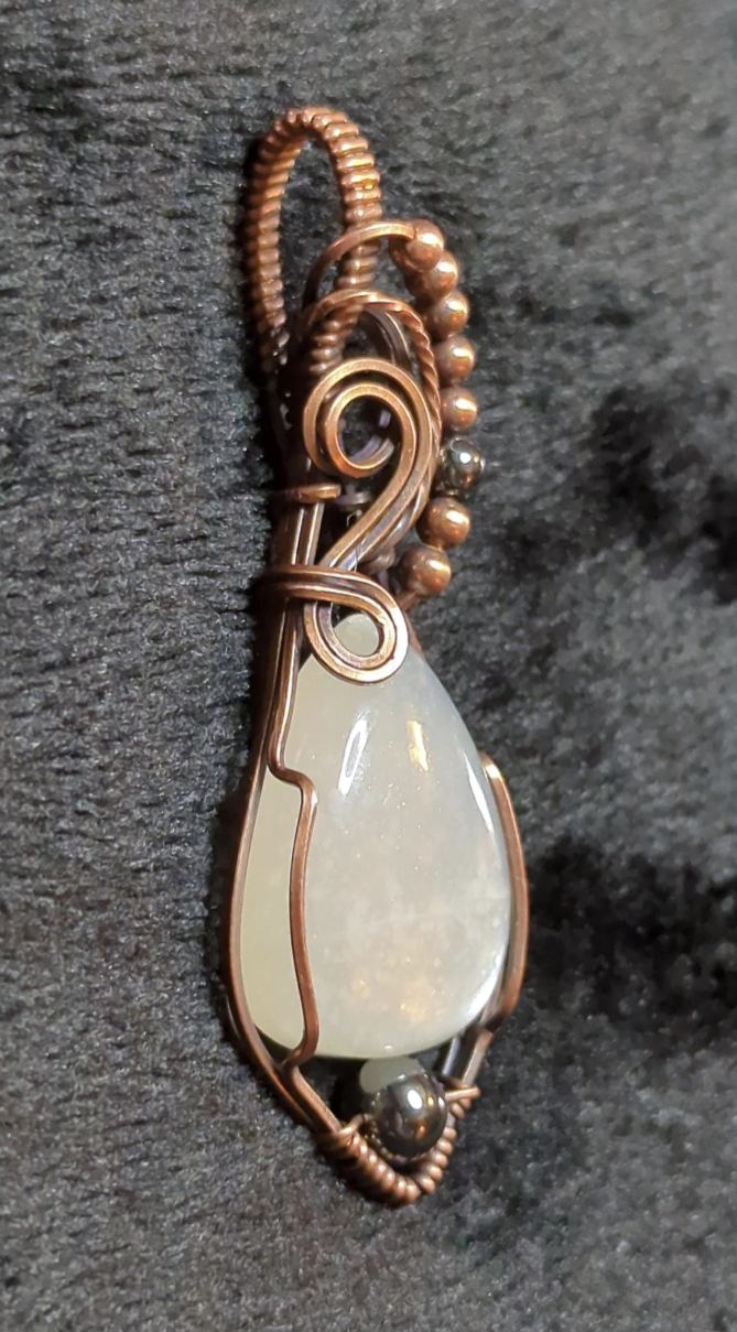 Moonstone gemstone pendant, with copper and hematite beads for accent, set in antiqued copper.
