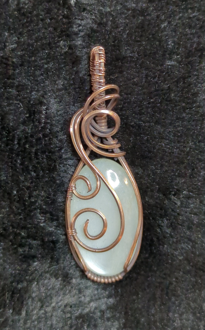 Moonstone gemstone pendant, set in antiqued copper.