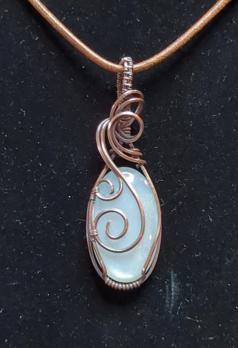 Moonstone gemstone pendant, set in antiqued copper.