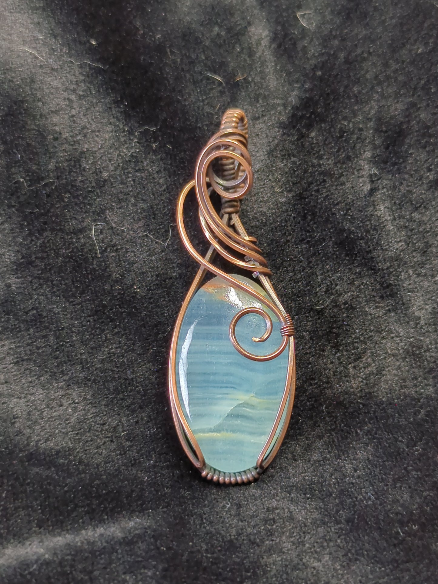 Blue Onyx Pendant, set in antiqued copper.