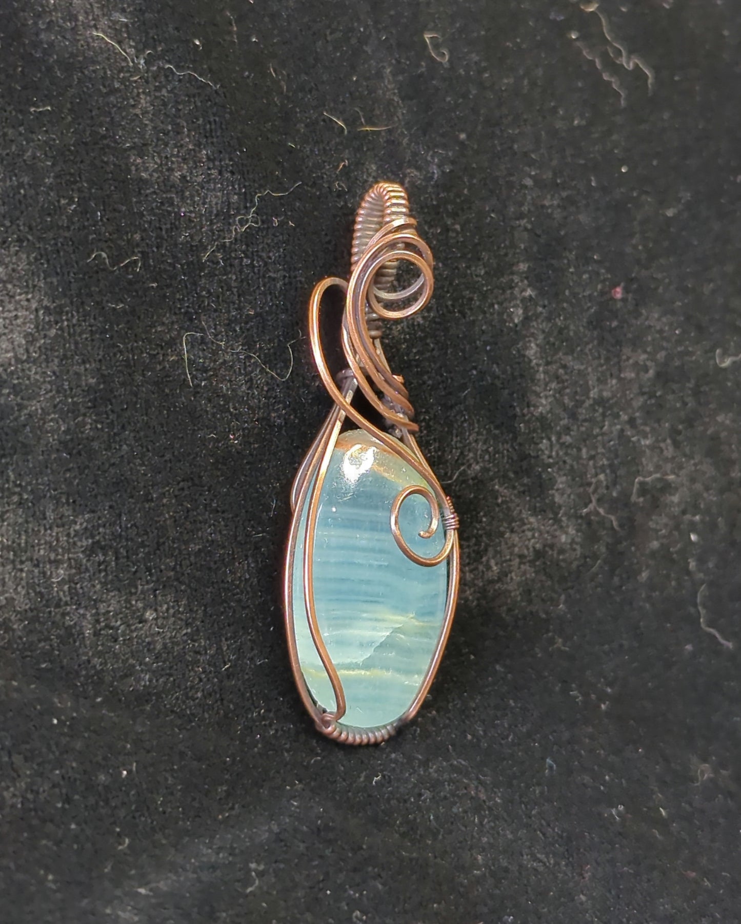 Blue Onyx Pendant, set in antiqued copper.