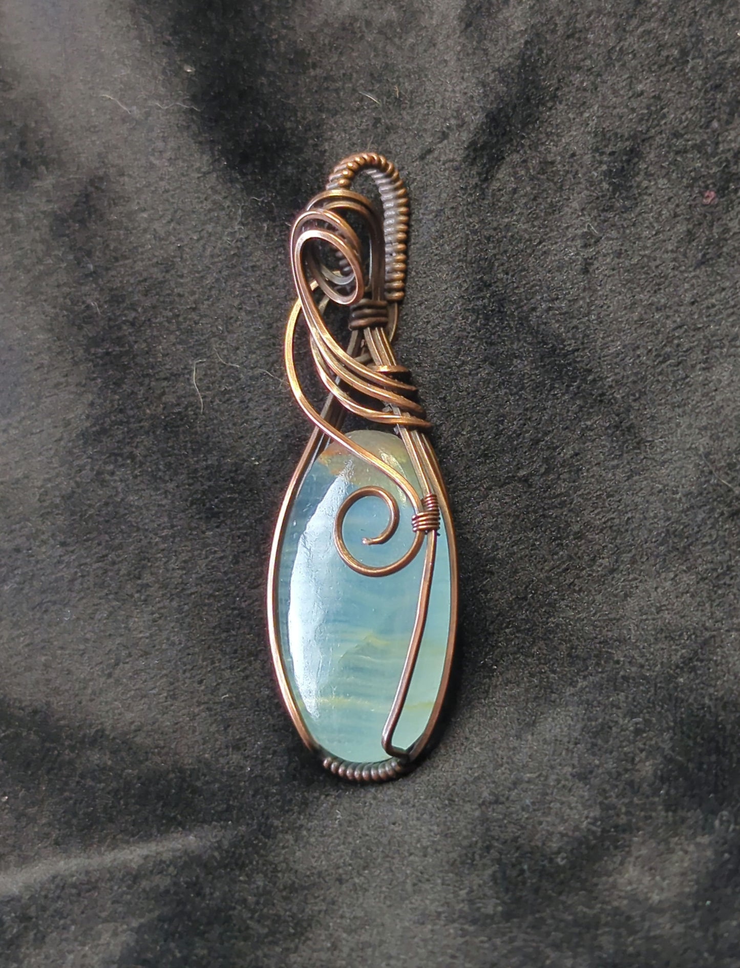 Blue Onyx Pendant, set in antiqued copper.