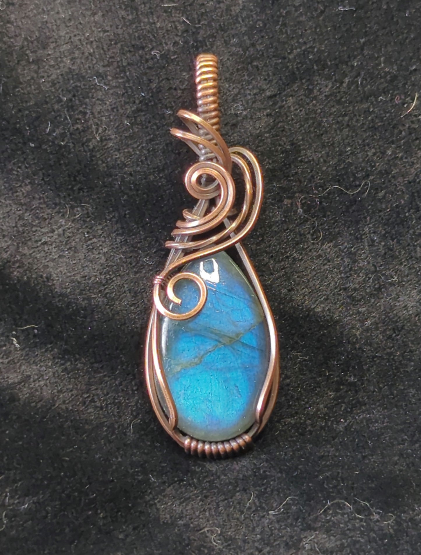 Labradorite gemstone pendant, with blue flash, set in antiqued copper.