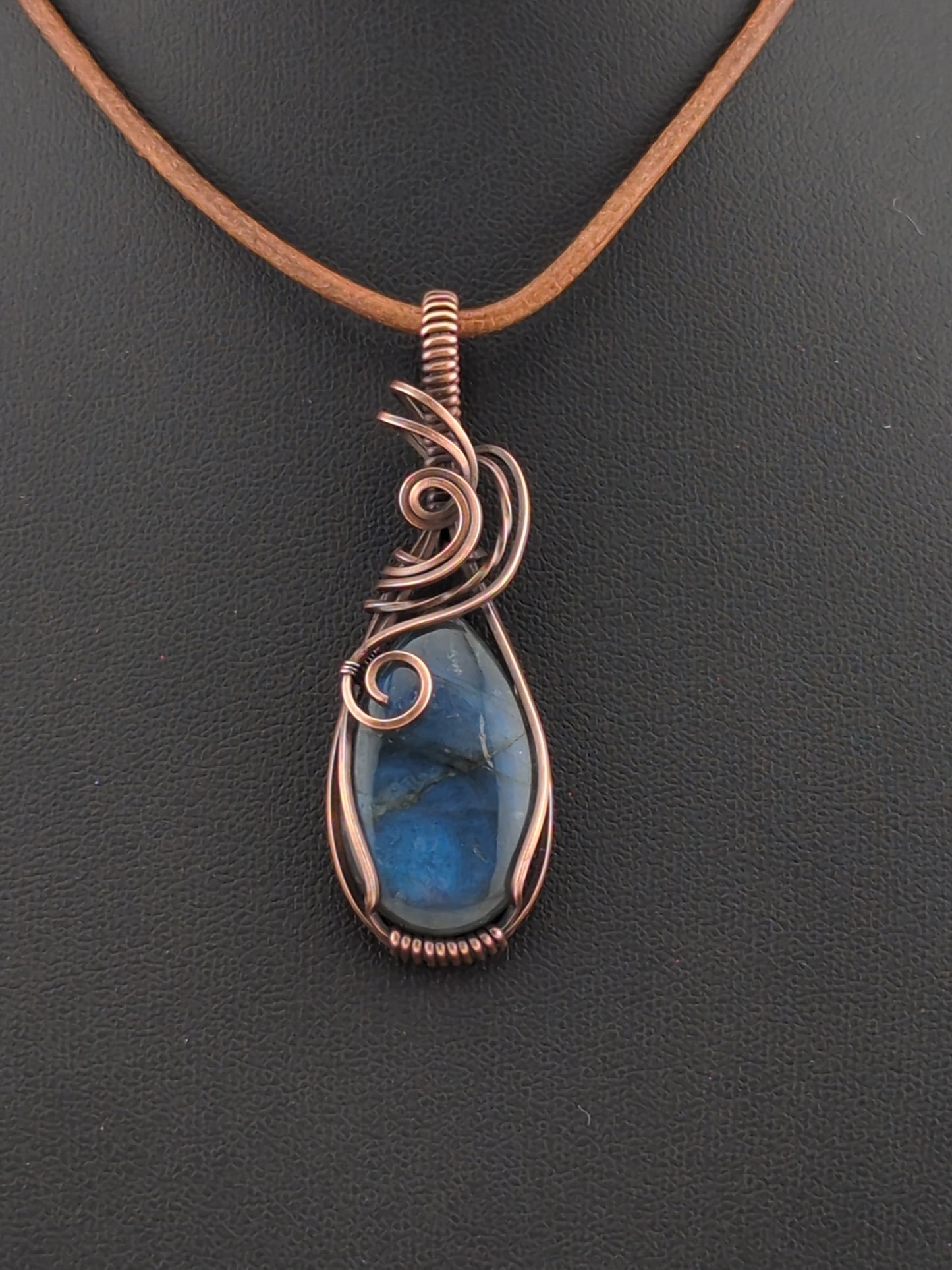 Labradorite gemstone pendant, with blue flash, set in antiqued copper.