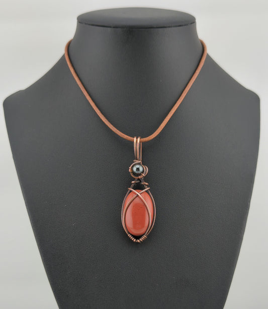 Red Jasper Pendant, set in antiqued copper, accented with Hematite.