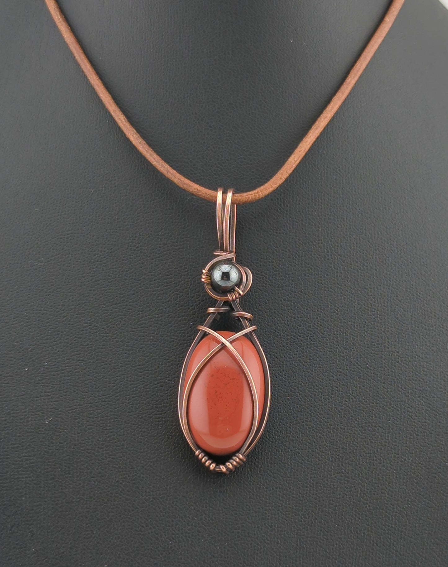 Red Jasper Pendant, set in antiqued copper, accented with Hematite.