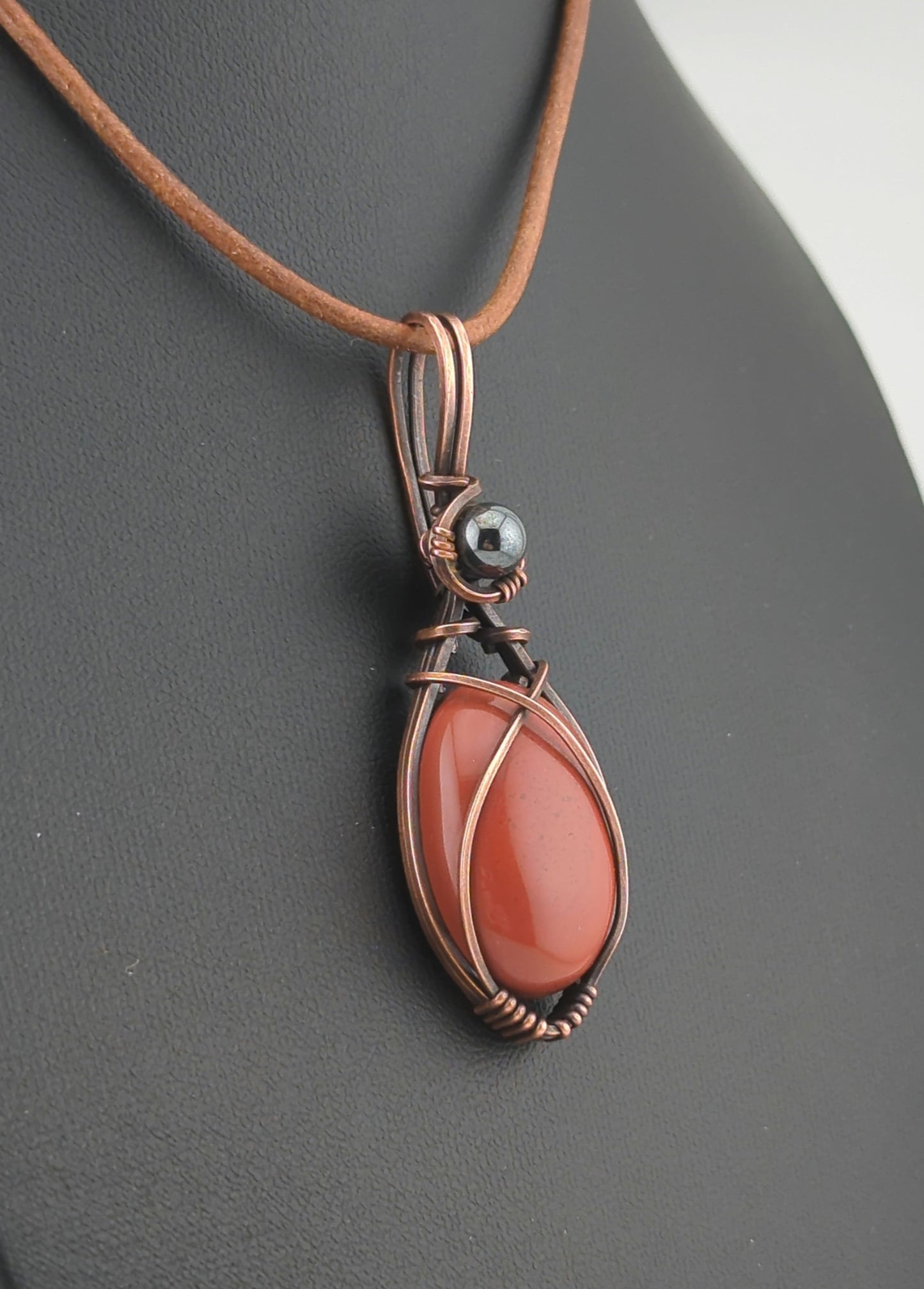 Red Jasper Pendant, set in antiqued copper, accented with Hematite.