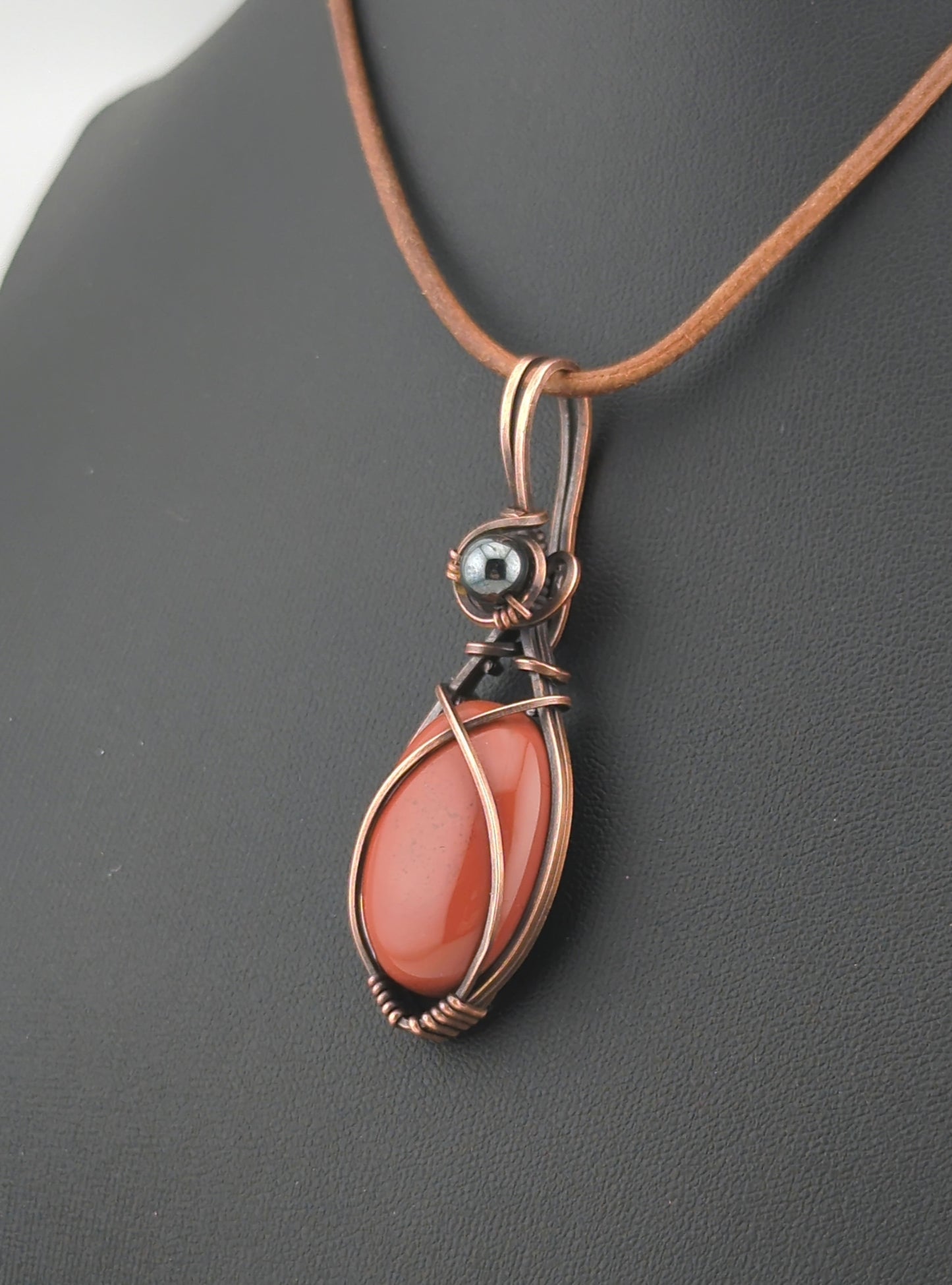 Red Jasper Pendant, set in antiqued copper, accented with Hematite.