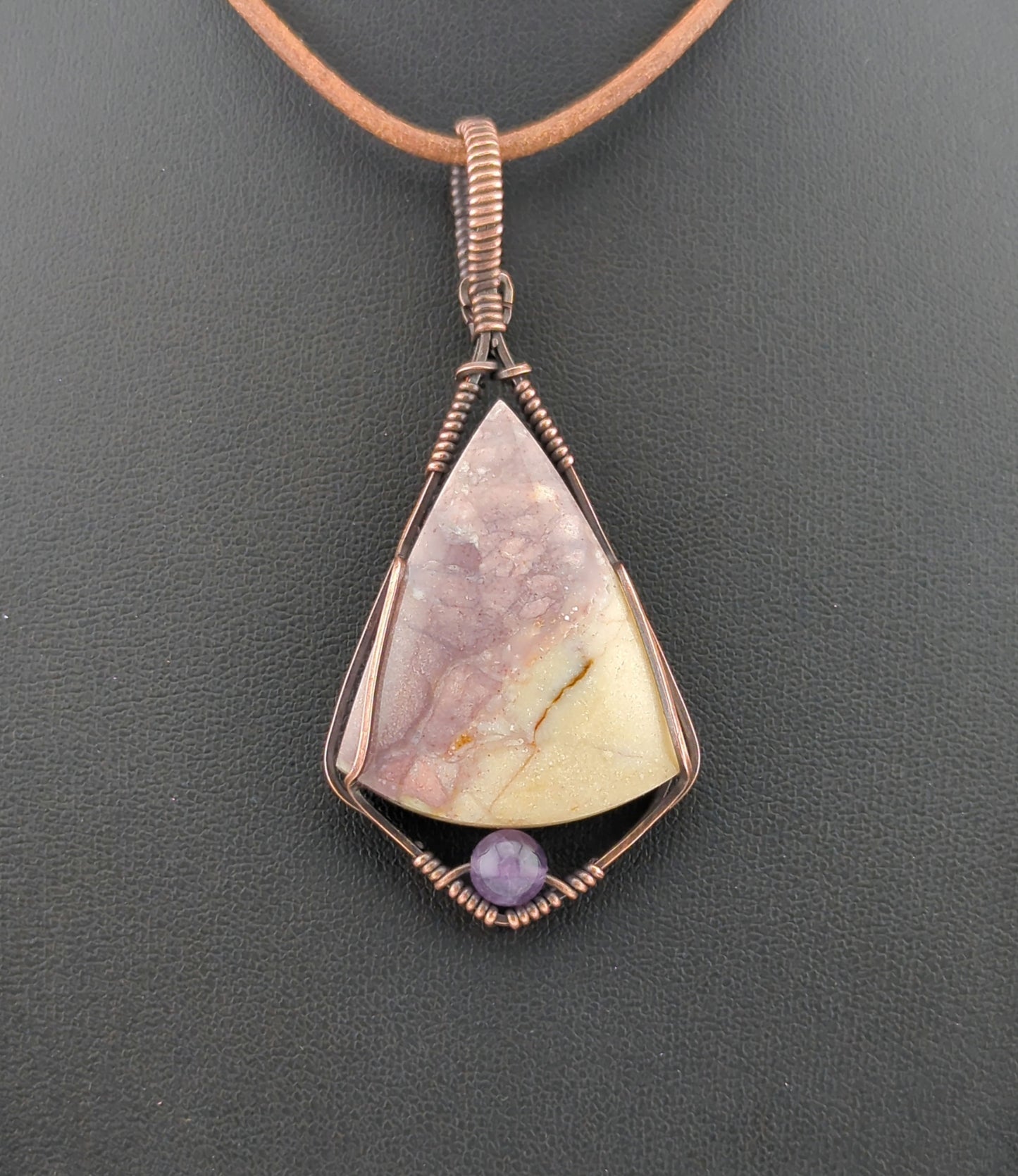 Indonesian agate Pendant, set in antiqued copper, accented with Amethyst.