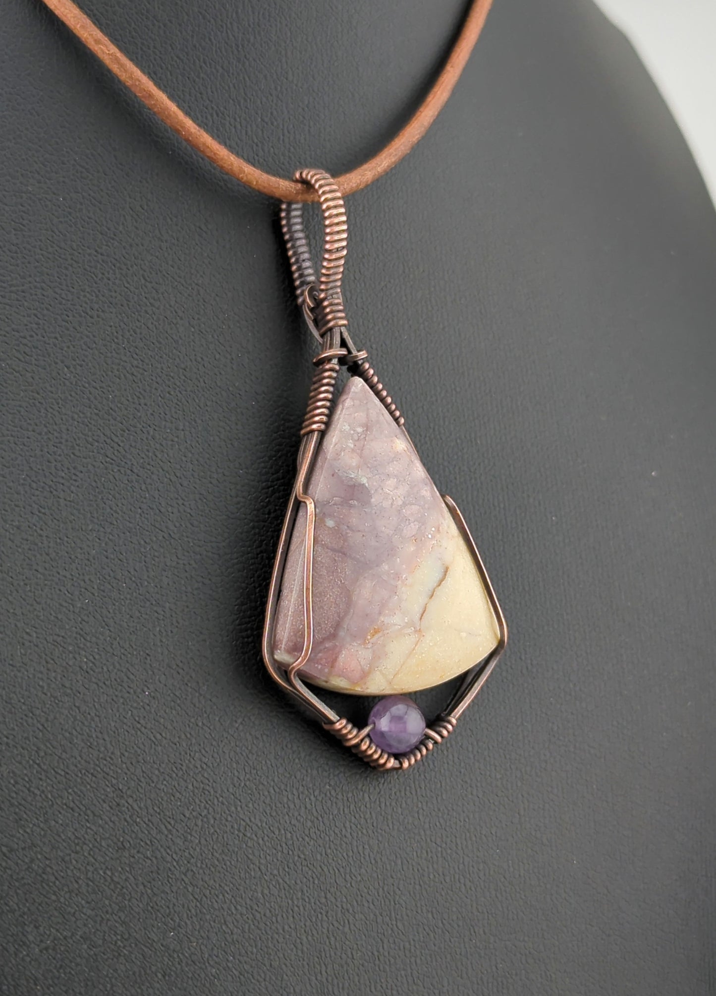 Indonesian agate Pendant, set in antiqued copper, accented with Amethyst.