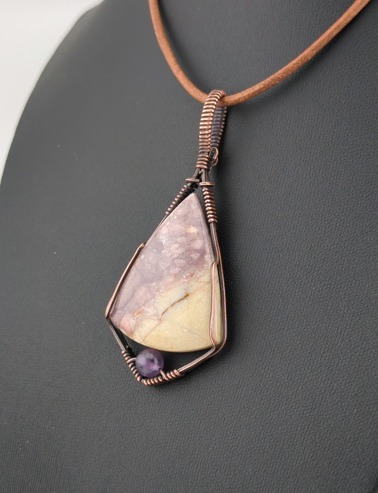 Indonesian agate Pendant, set in antiqued copper, accented with Amethyst.