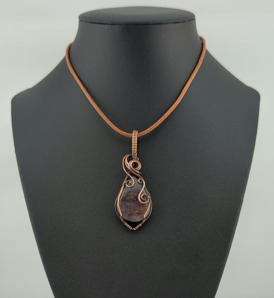 Bloodshot Iolite Pendant, set in antiqued copper.