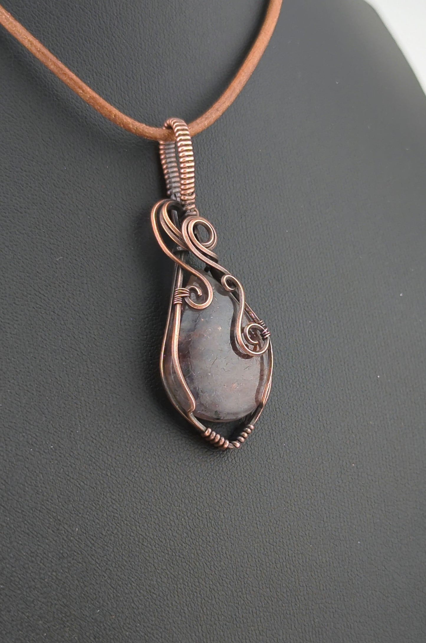 Bloodshot Iolite Pendant, set in antiqued copper.