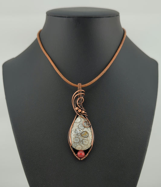 Coral Fossil Pendant, set in antiqued copper, accented with Carnelian.