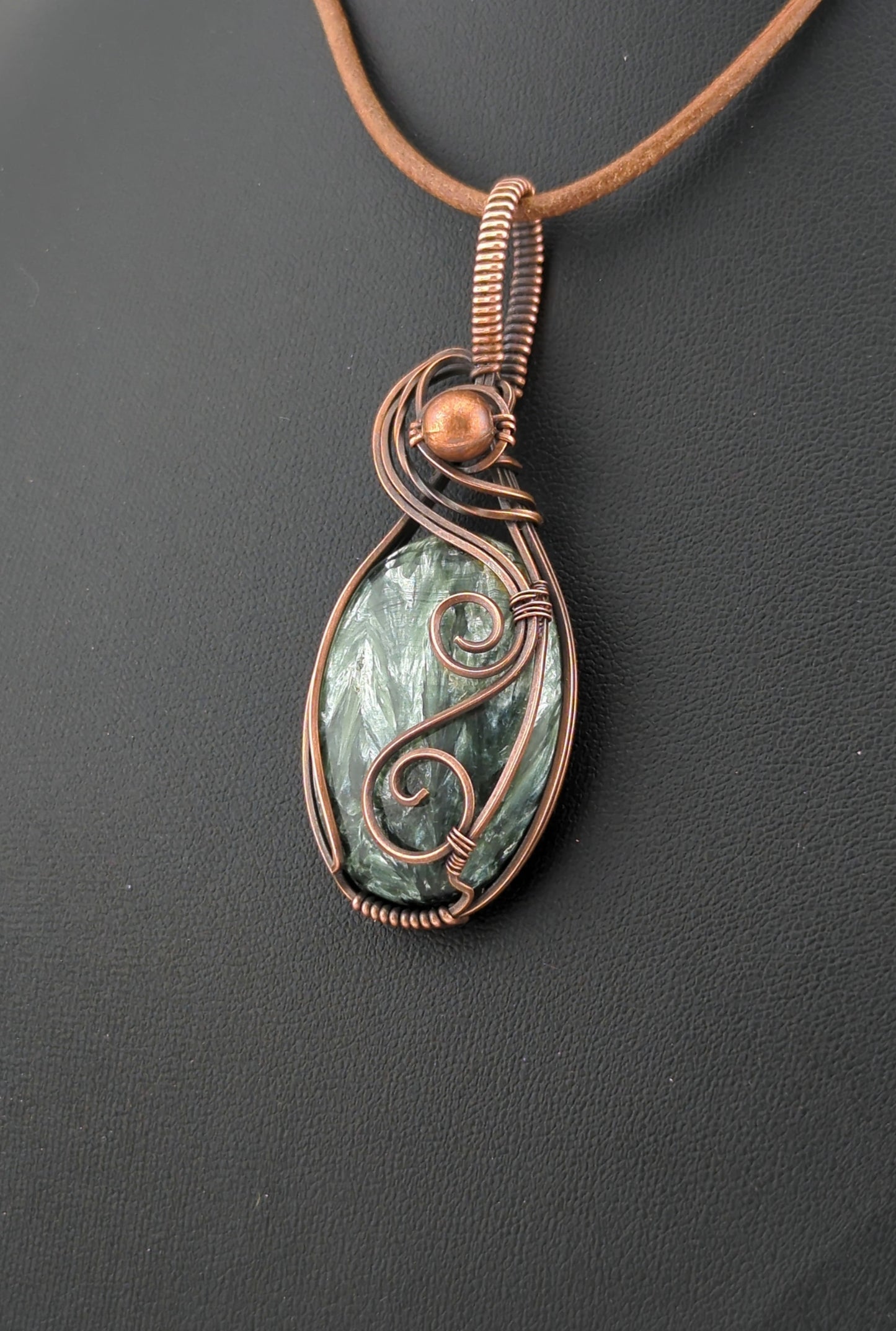 Seraphinite pendant, set in antiqued copper.