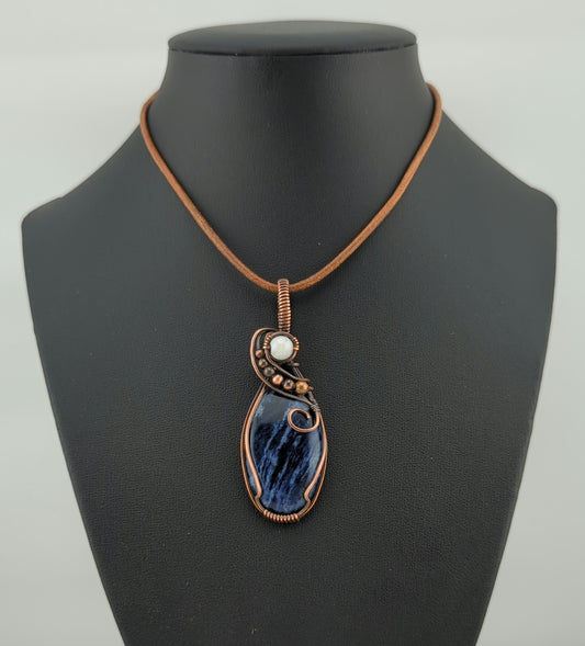 Sodalite Pendant, set in antiqued copper, accented with Moonstone.