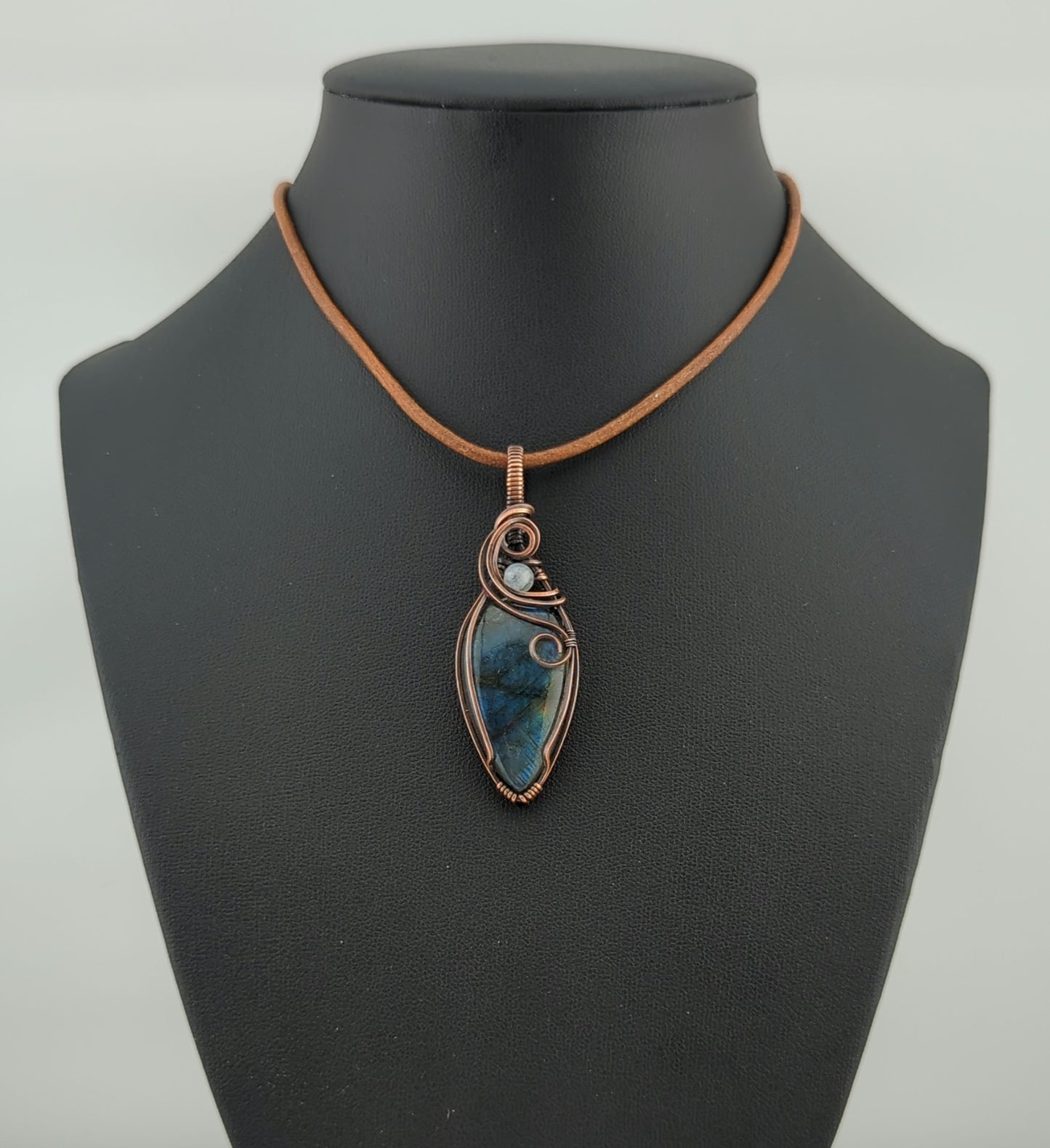 Labradorite Pendant, with blue flash, set in antiqued copper accented with Moonstone.