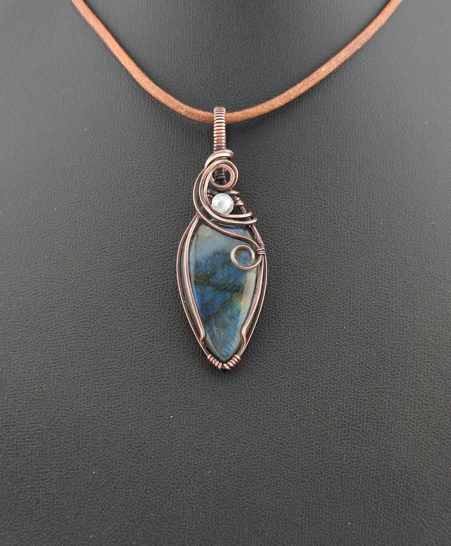 Labradorite Pendant, with blue flash, set in antiqued copper accented with Moonstone.