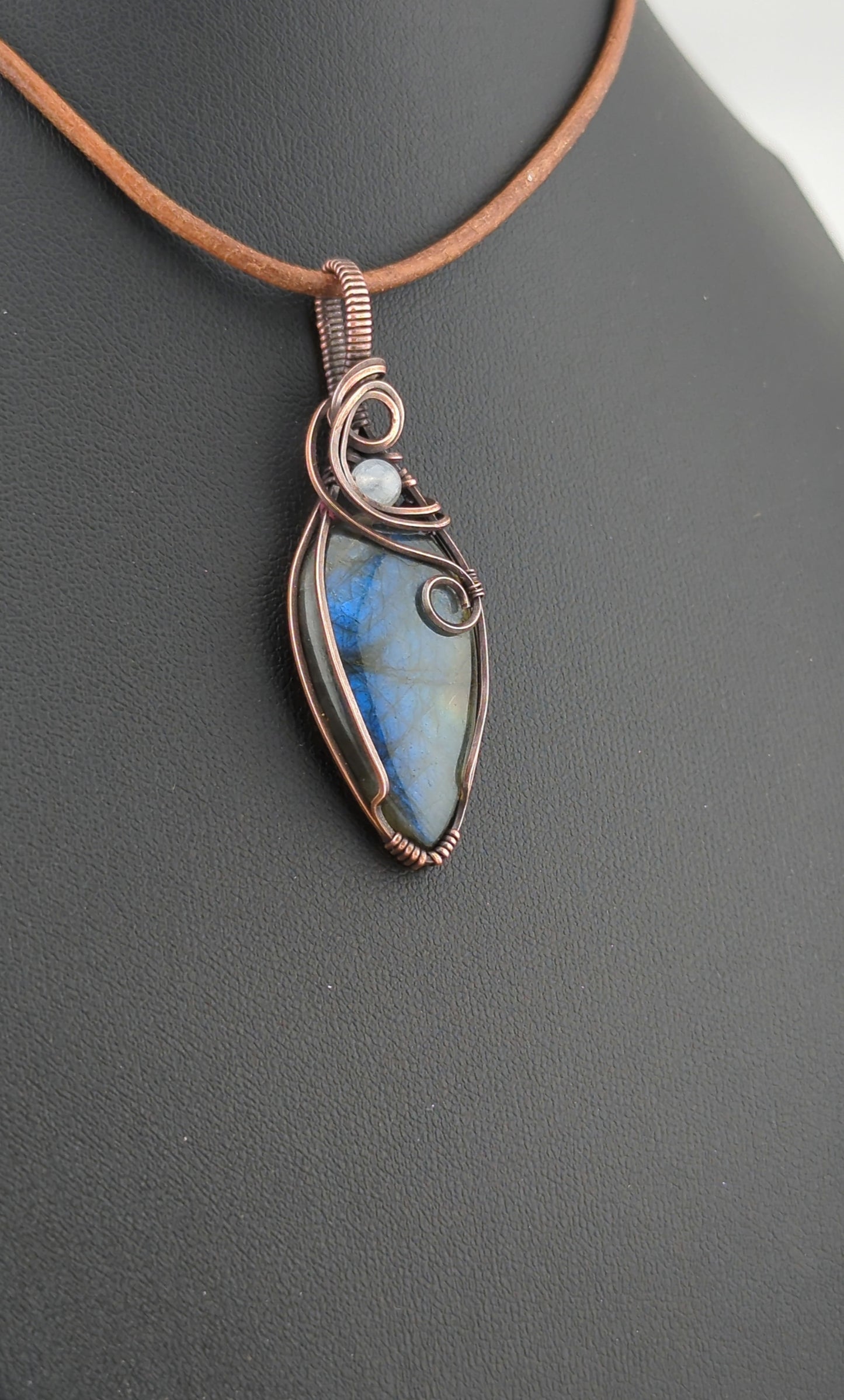 Labradorite Pendant, with blue flash, set in antiqued copper accented with Moonstone.