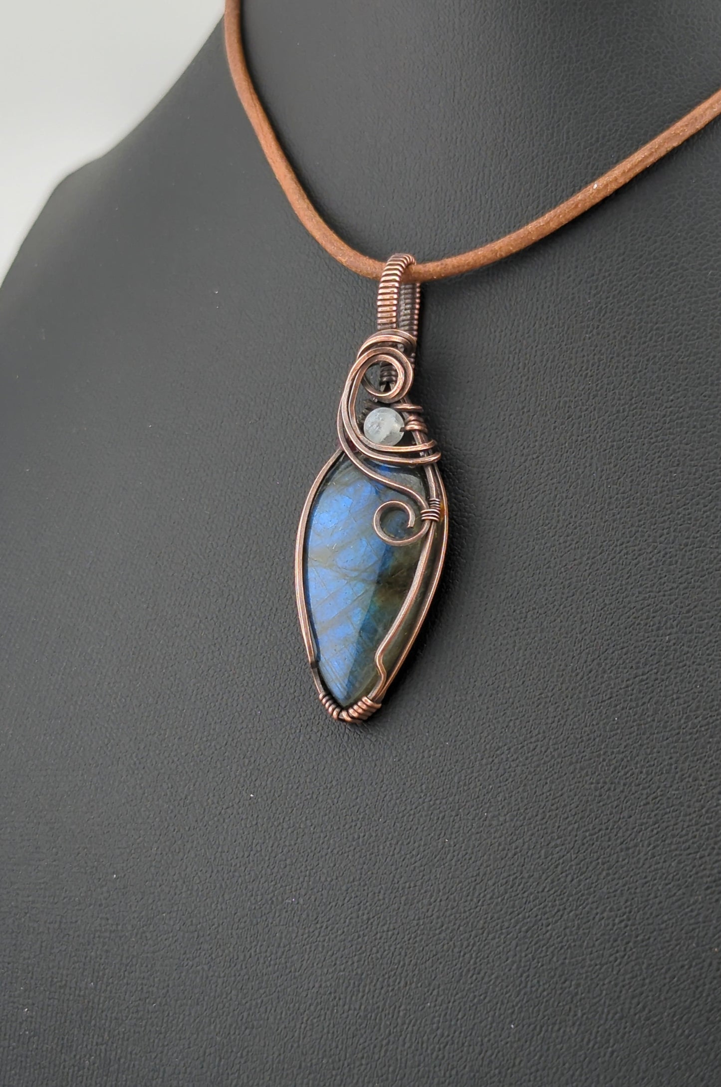 Labradorite Pendant, with blue flash, set in antiqued copper accented with Moonstone.