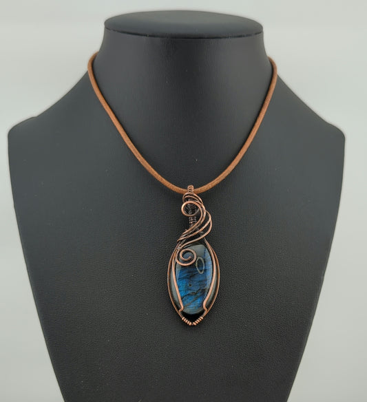 Labradorite Pendant, with blue flash, set in antiqued copper.