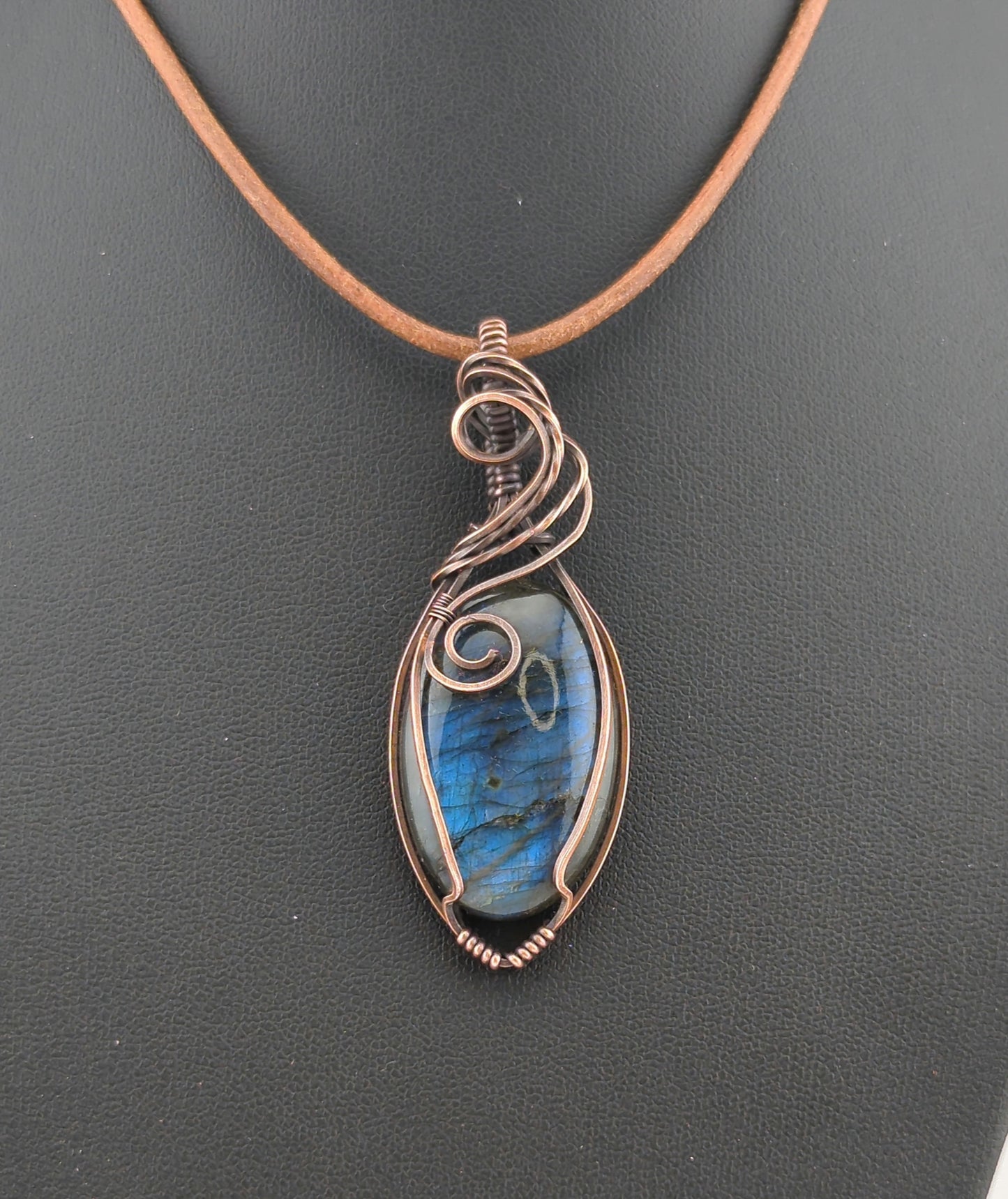 Labradorite Pendant, with blue flash, set in antiqued copper.