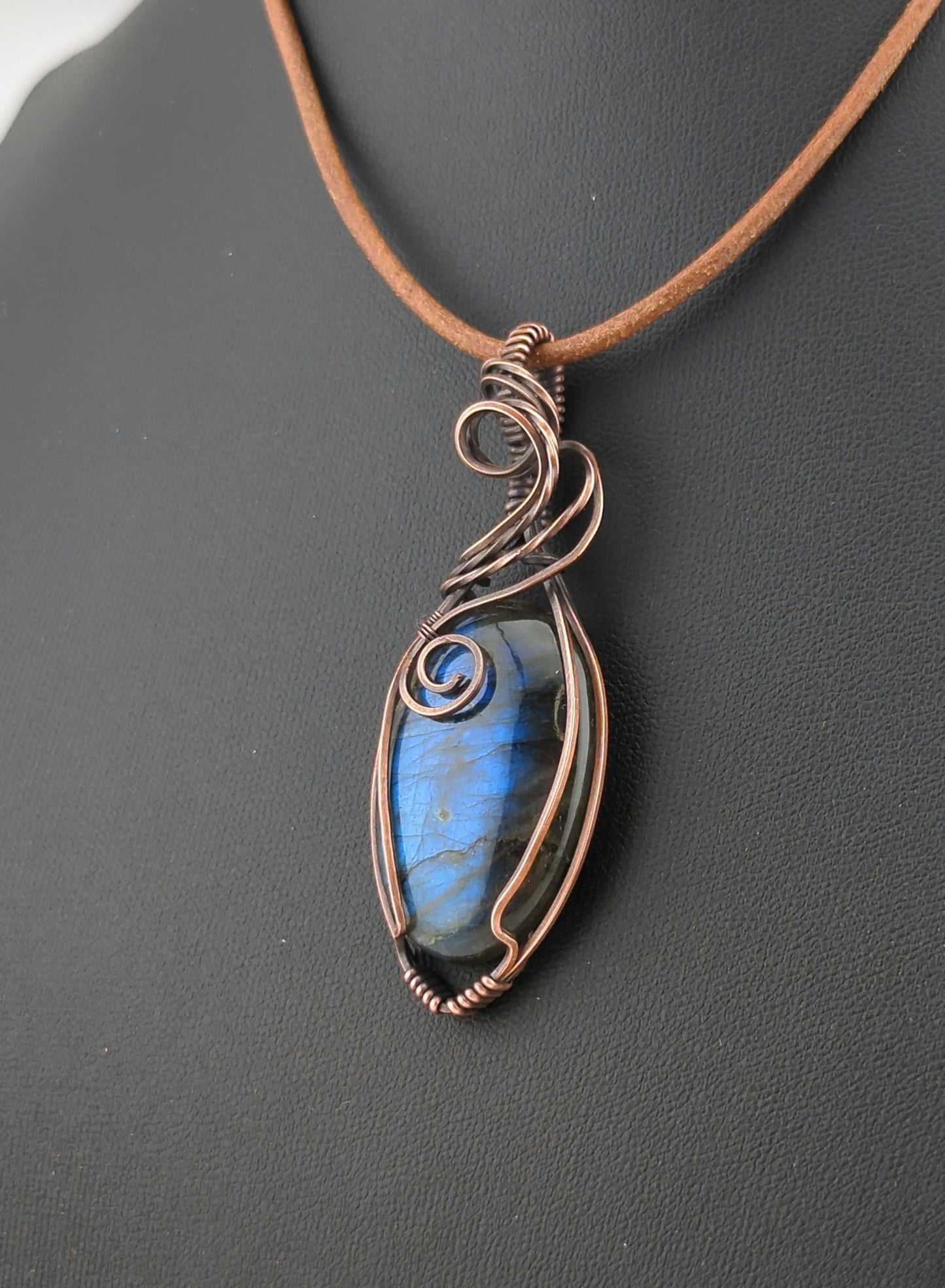 Labradorite Pendant, with blue flash, set in antiqued copper.