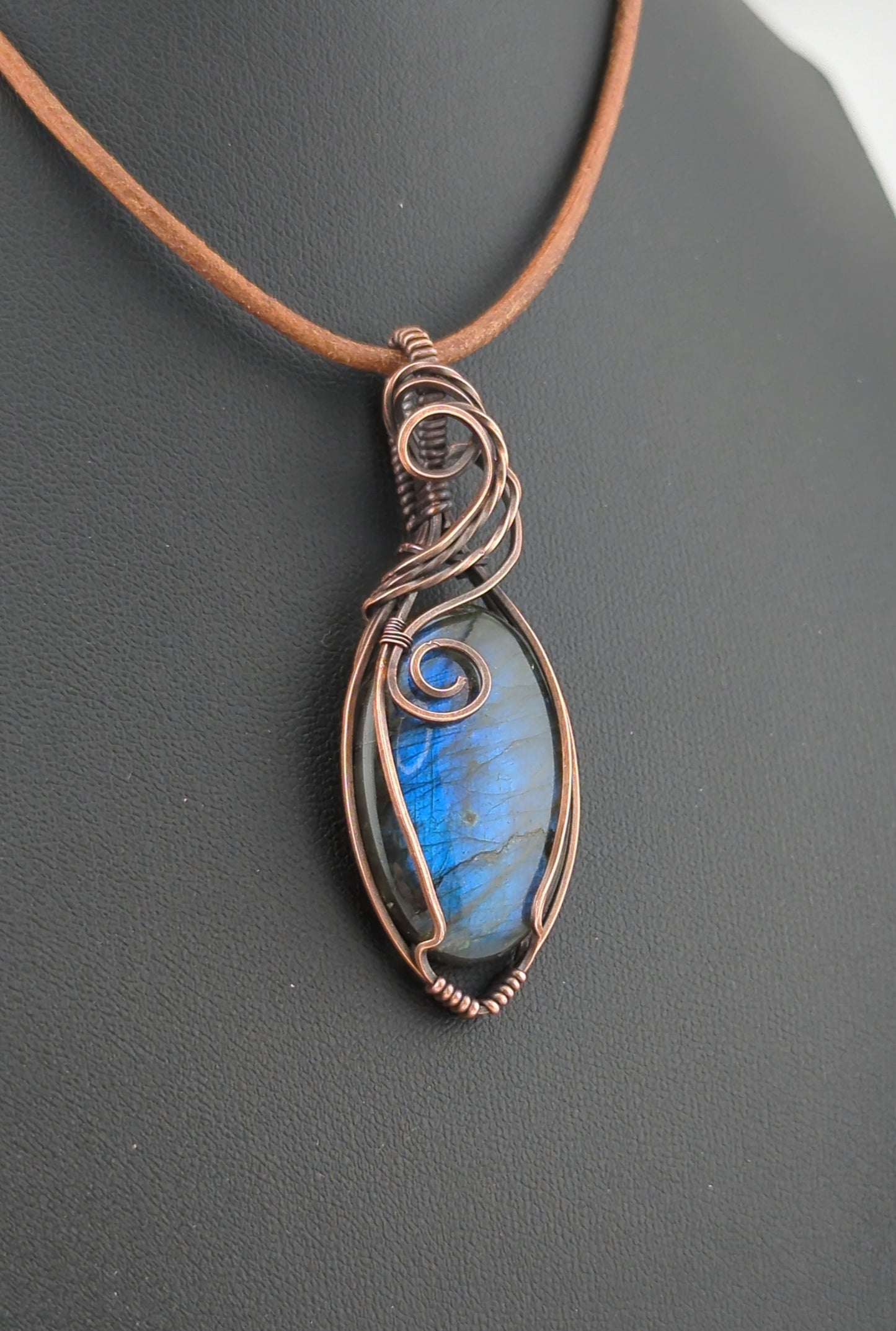 Labradorite Pendant, with blue flash, set in antiqued copper.