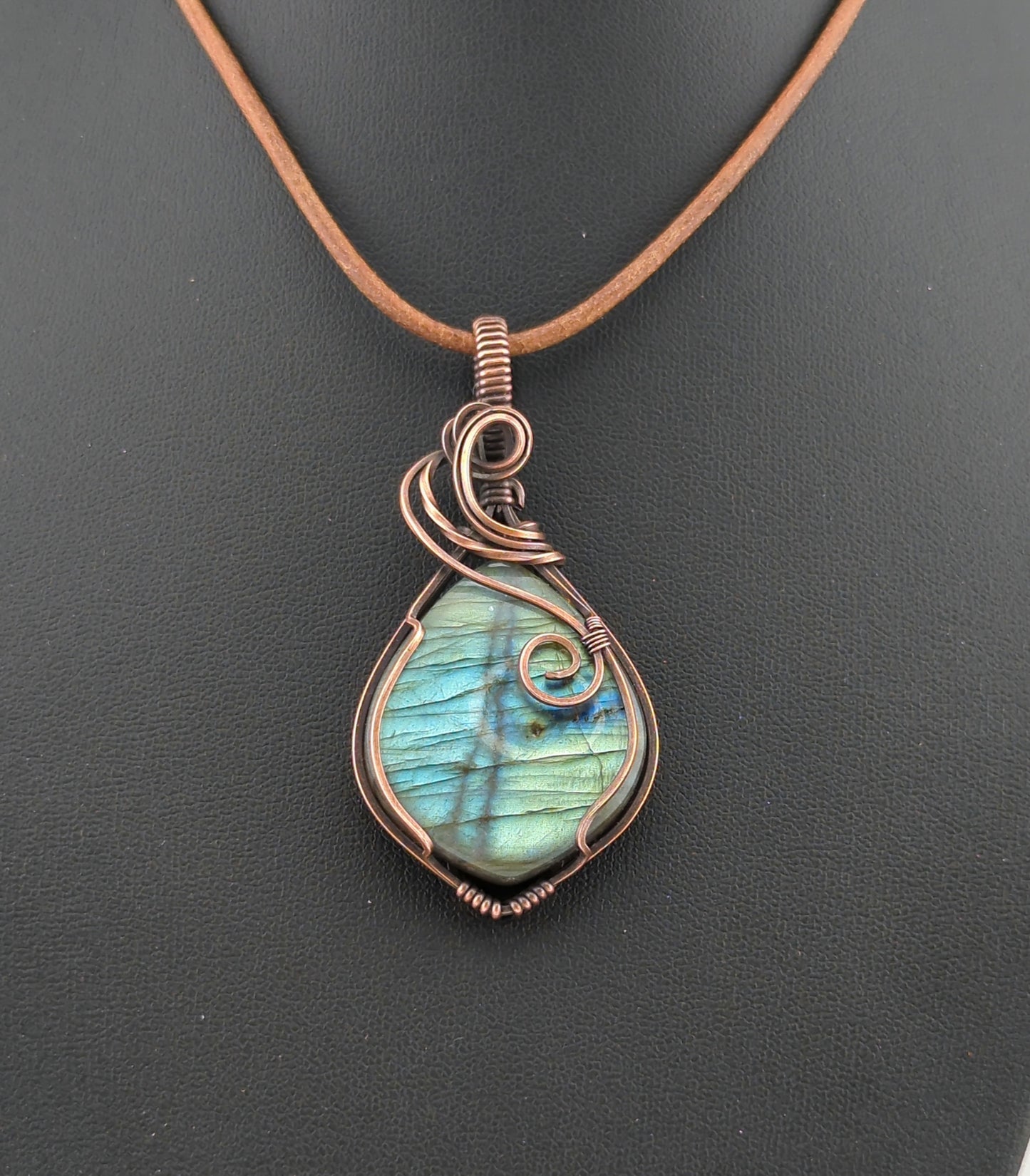 Labradorite Pendant, with green and blue flash, set in antiqued copper.