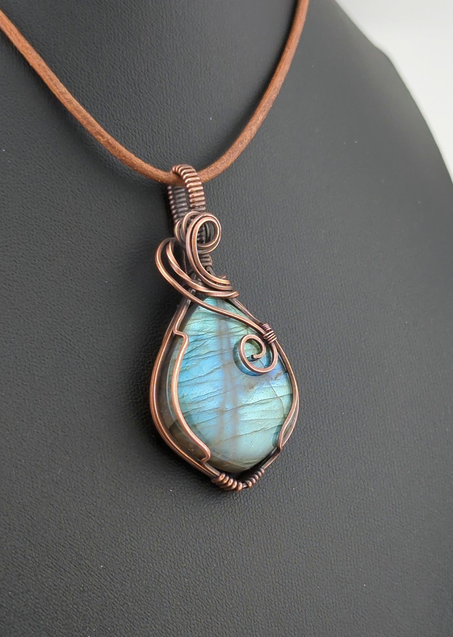 Labradorite Pendant, with green and blue flash, set in antiqued copper.