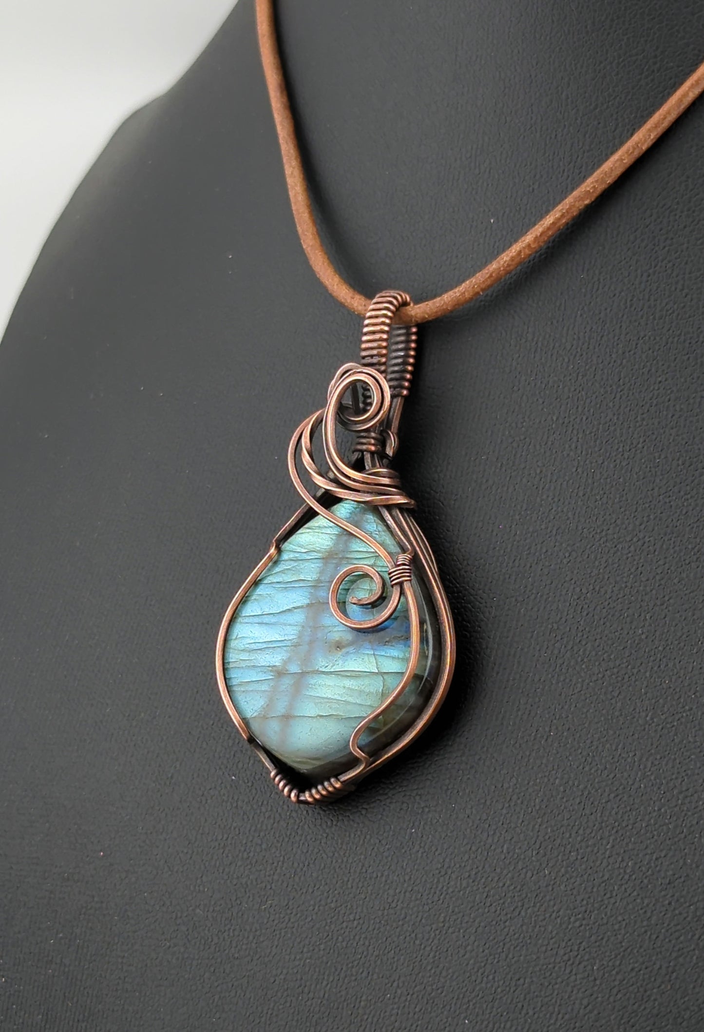 Labradorite Pendant, with green and blue flash, set in antiqued copper.