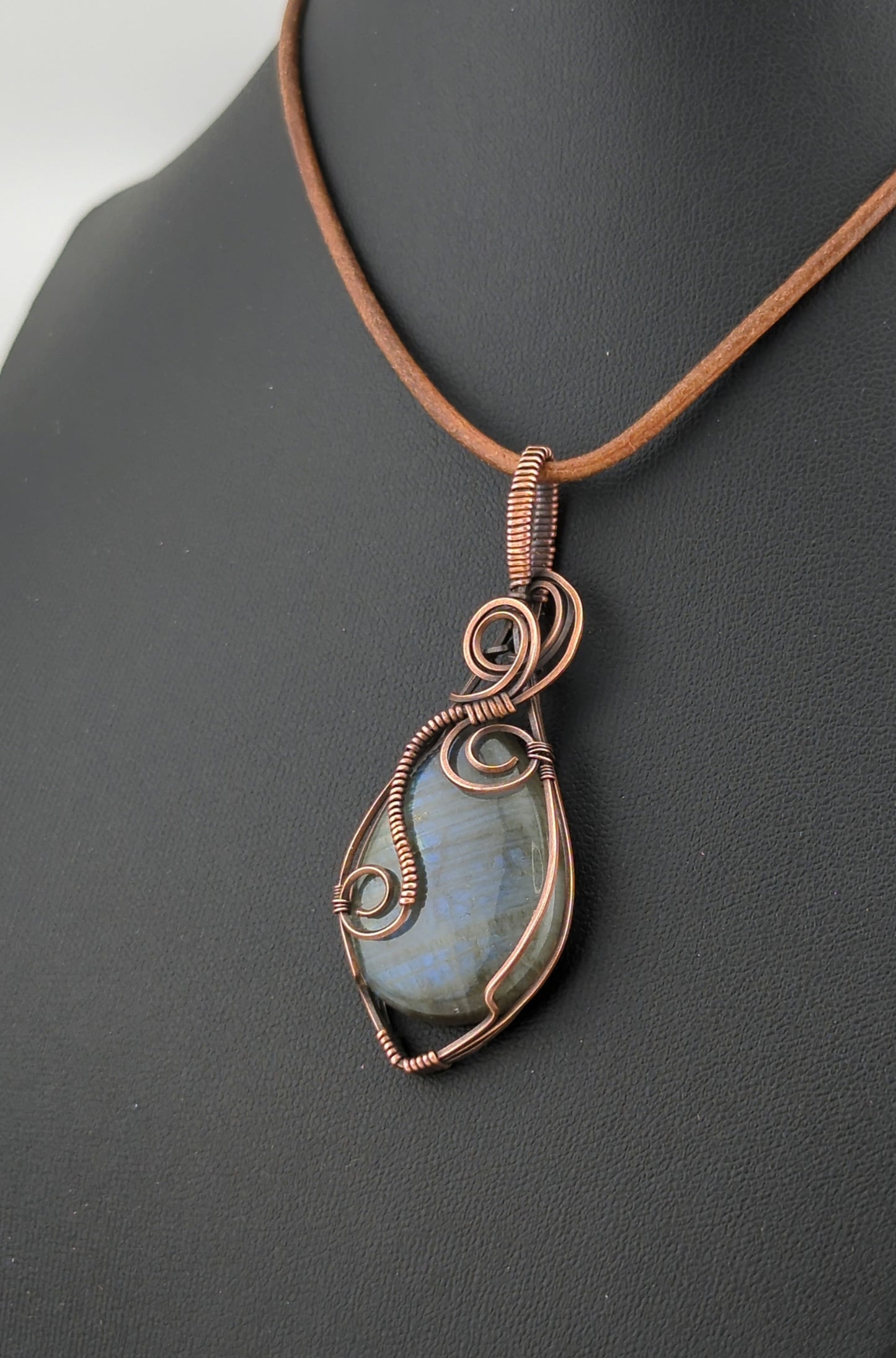 Labradorite Pendant, with blue flash, set in antiqued copper.