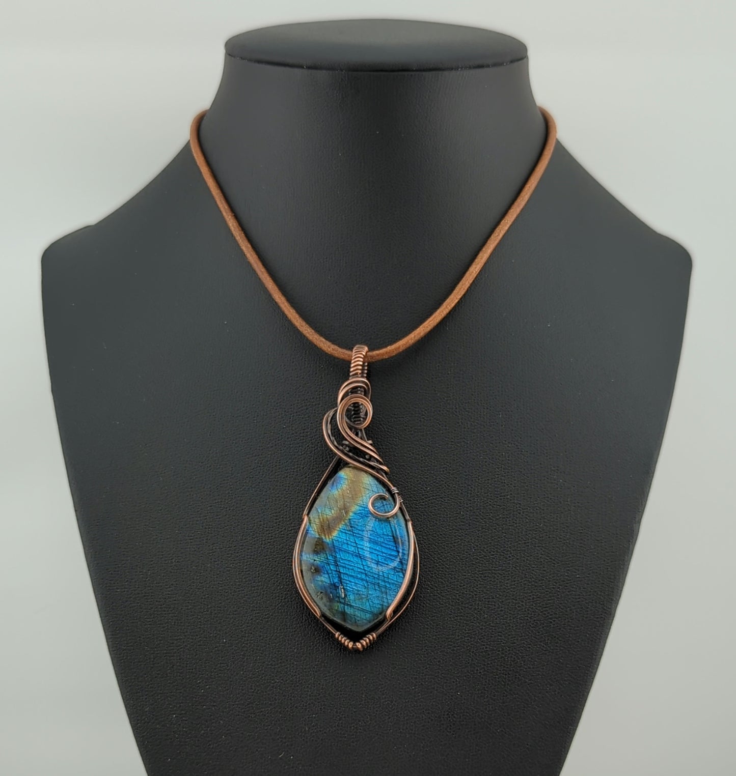 Labradorite Pendant, with blue flash, set in antiqued copper.