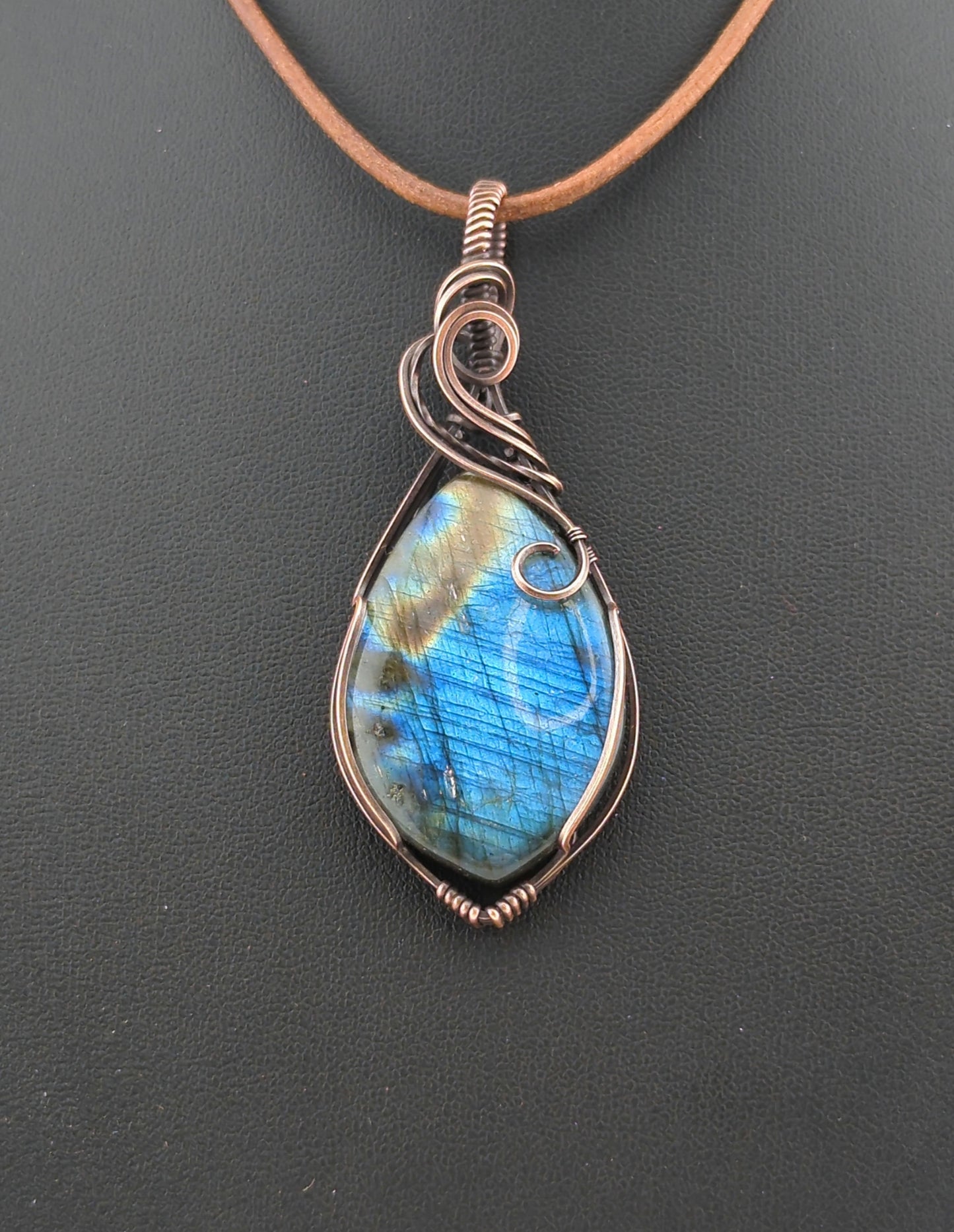 Labradorite Pendant, with blue flash, set in antiqued copper.