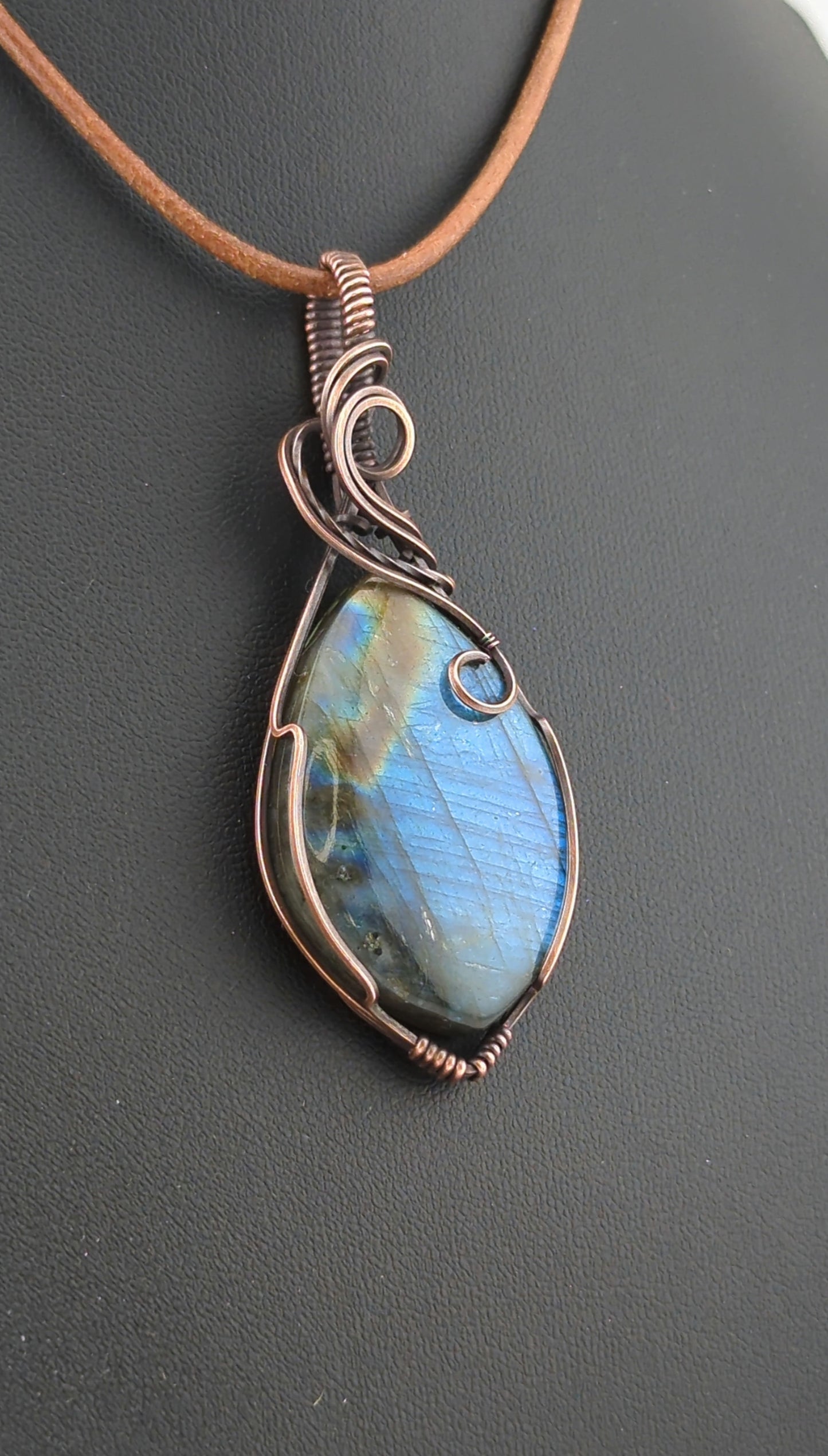 Labradorite Pendant, with blue flash, set in antiqued copper.