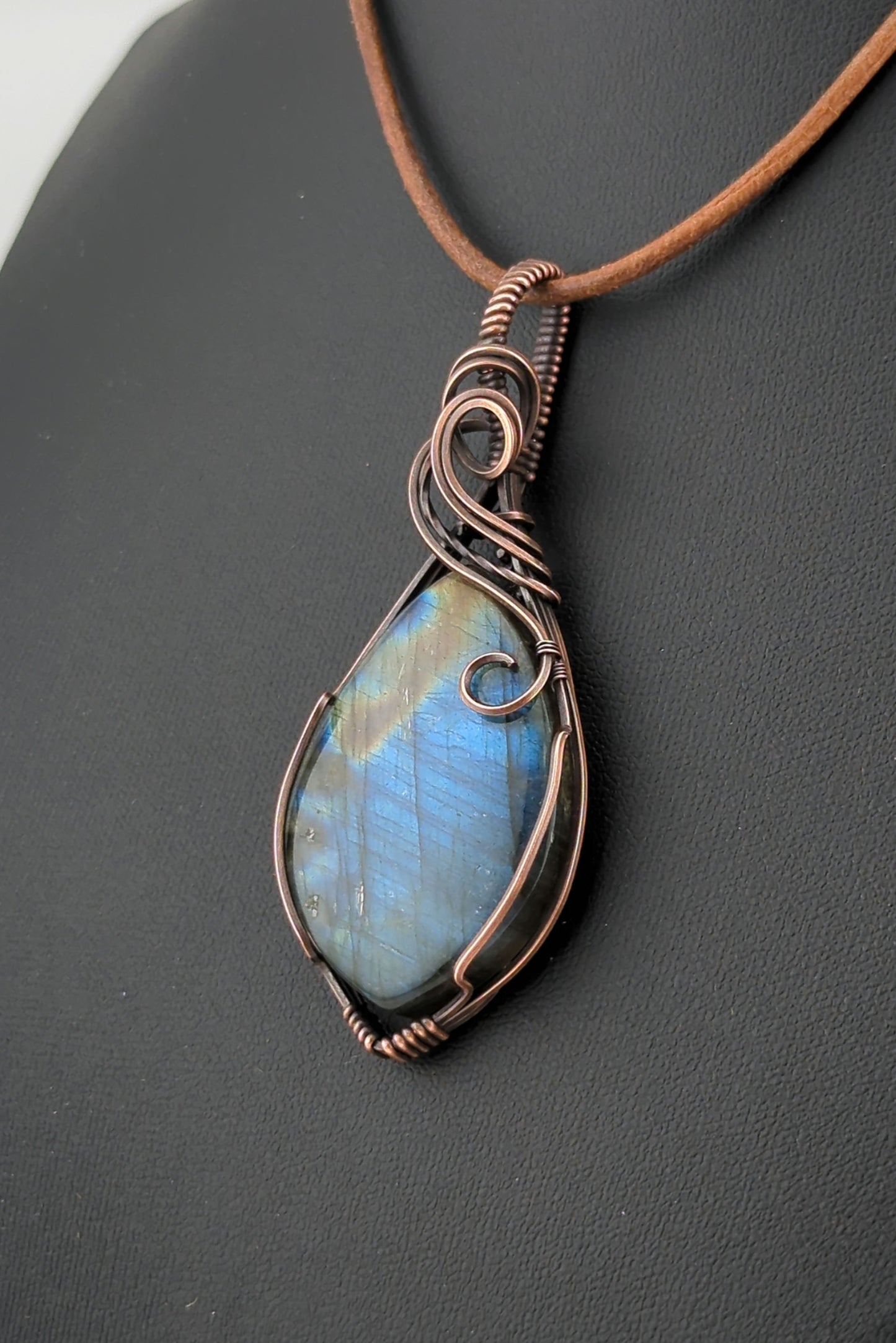 Labradorite Pendant, with blue flash, set in antiqued copper.