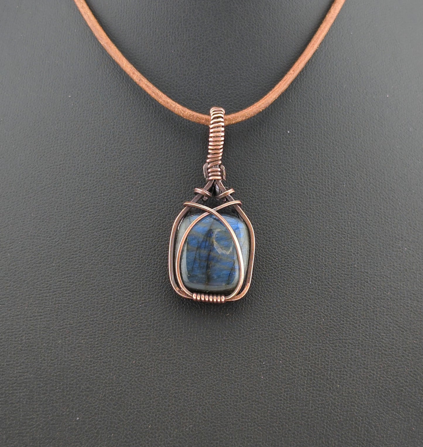 Labradorite Pendant, with blue flash, set in antiqued copper.