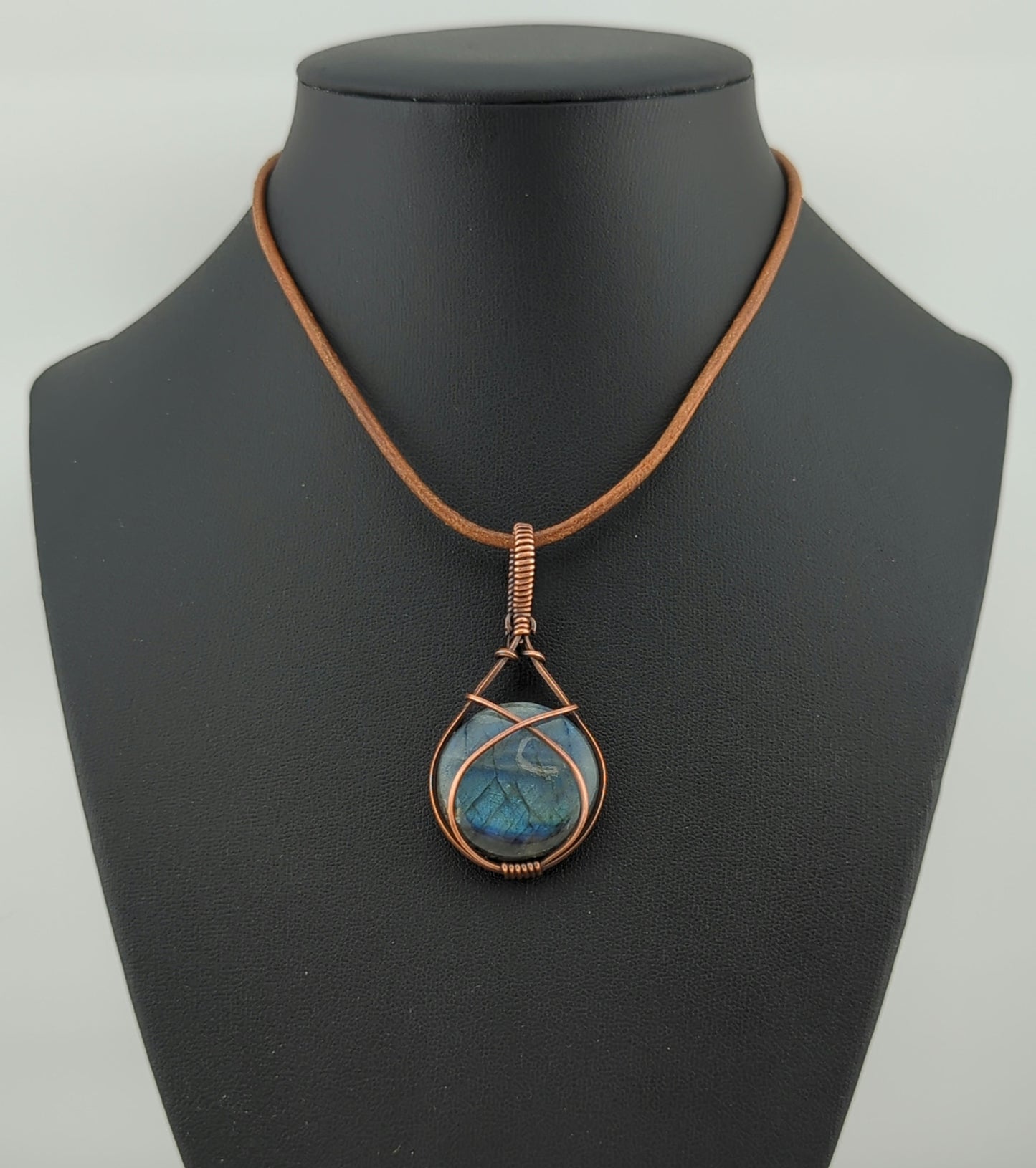 Labradorite Pendant, with blue flash, set in antiqued copper.