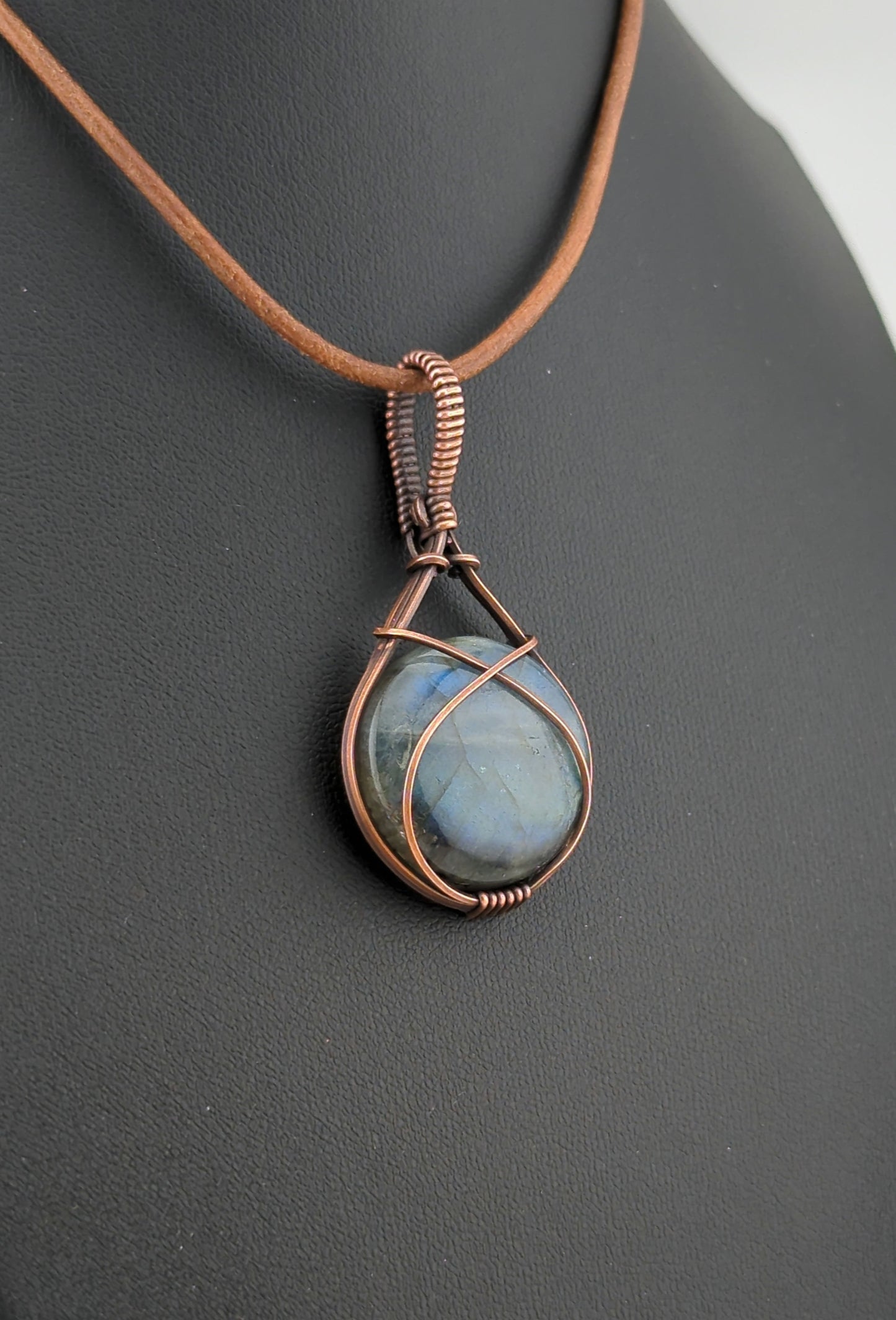 Labradorite Pendant, with blue flash, set in antiqued copper.